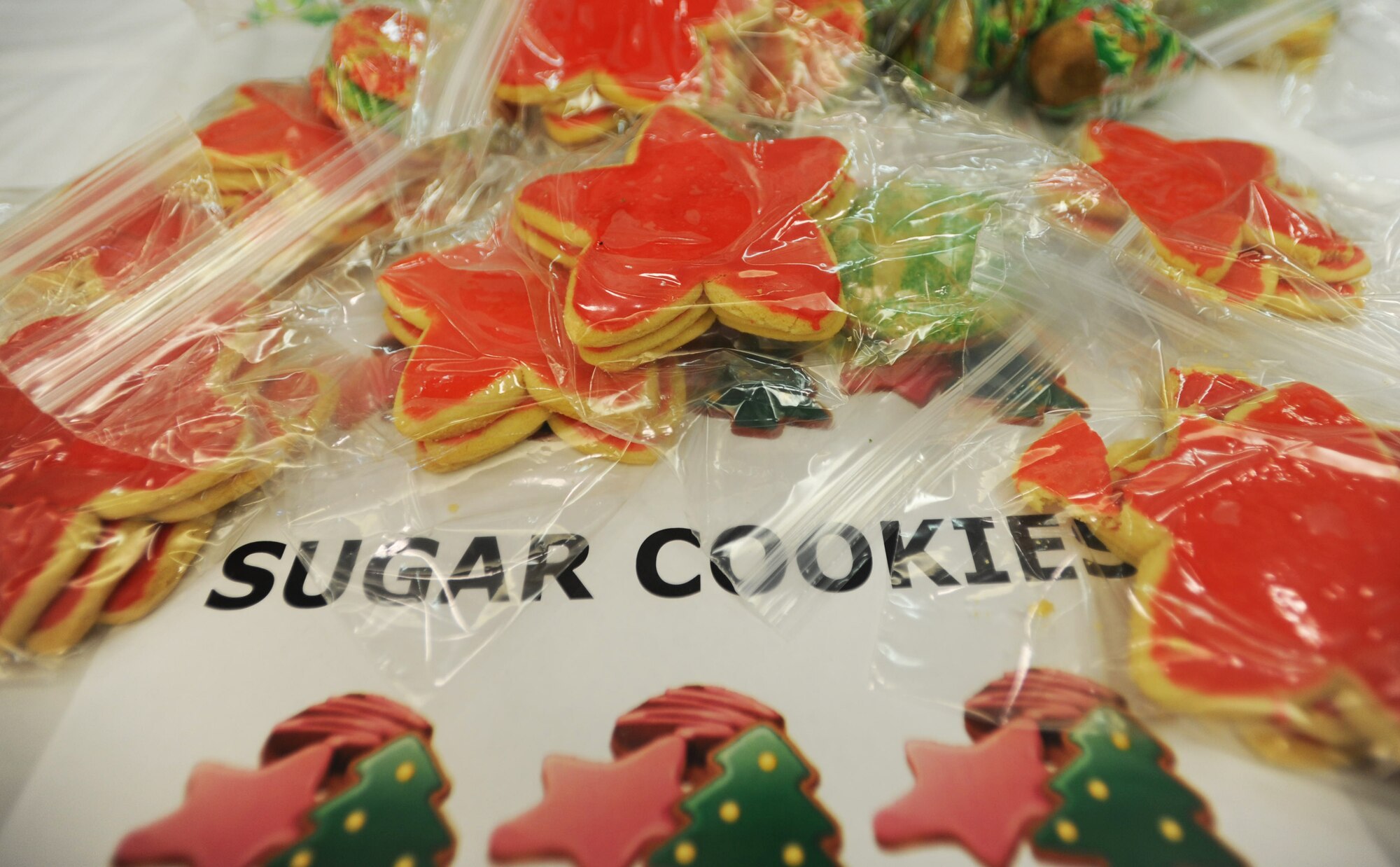 Sugar cookies were baked for Airmen and their families as part of the annual Cookie Caper event Dec. 9 at Joint Base Pearl Harbor-Hickam, Hawaii. More than 27,000 cookies were baked and donated to brighten the spirits of Airmen stationed here. (U.S. Air Force Photo/Airman 1st Class Lauren Main)
