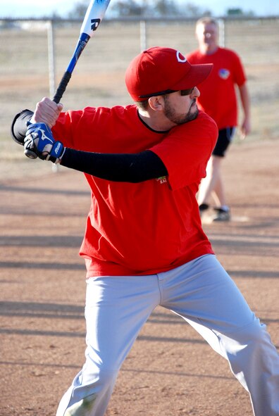 The top players in this year's intramural softball league play aainst one another in the All-Star Game Oct. 27, 2010.  The East team won against the West team with a score of 14-10.  The SSI team beat the Security Forces team in both games of the championship held Oct. 19 and Oct. 26 (continuing with extra innings on Oct. 28).  The scores of the games were 4-3 and 19-18.  Although SSI earned the title of base champions, the Security Forces team was the league champion for the best record during the season.  (U.S. Air Force photos/ Henry Kim)