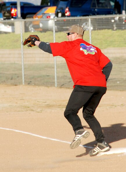 The top players in this year's intramural softball league play aainst one another in the All-Star Game Oct. 27, 2010.  The East team won against the West team with a score of 14-10.  The SSI team beat the Security Forces team in both games of the championship held Oct. 19 and Oct. 26 (continuing with extra innings on Oct. 28).  The scores of the games were 4-3 and 19-18.  Although SSI earned the title of base champions, the Security Forces team was the league champion for the best record during the season.  (U.S. Air Force photos/ Henry Kim)