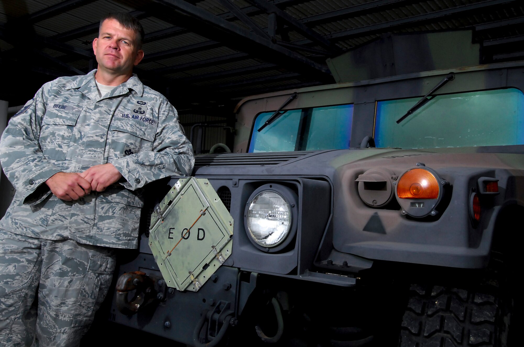 Master Sgt. John Beebe, an explosive ordnance disposal technician, leans against an EOD HMMWV, Dec. 7. Sergeant Beebe, a 20-year veteran of the Marine Corps and Air Force, is currently the Kadena's 18th Civil Engineer Squadron EOD superintendent. (U.S. Air Force photo/ Airman 1st Class Maeson L. Elleman)