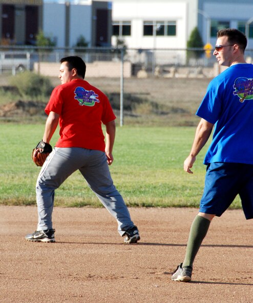 The top players in this year's intramural softball league play aainst one another in the All-Star Game Oct. 27, 2010.  The East team won against the West team with a score of 14-10.  The SSI team beat the Security Forces team in both games of the championship held Oct. 19 and Oct. 26 (continuing with extra innings on Oct. 28).  The scores of the games were 4-3 and 19-18.  Although SSI earned the title of base champions, the Security Forces team was the league champion for the best record during the season.  (U.S. Air Force photos/ Henry Kim)