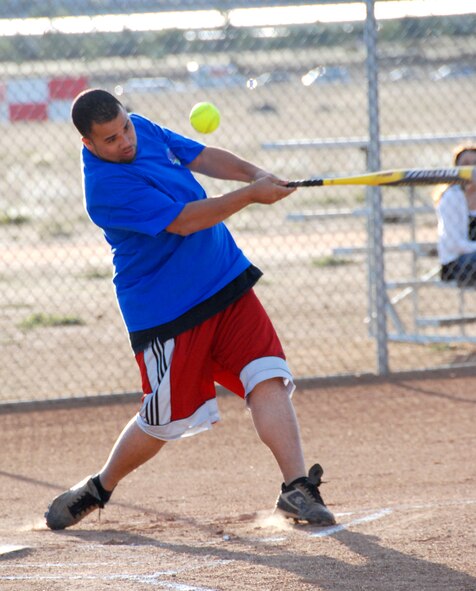 The top players in this year's intramural softball league play aainst one another in the All-Star Game Oct. 27, 2010.  The East team won against the West team with a score of 14-10.  The SSI team beat the Security Forces team in both games of the championship held Oct. 19 and Oct. 26 (continuing with extra innings on Oct. 28).  The scores of the games were 4-3 and 19-18.  Although SSI earned the title of base champions, the Security Forces team was the league champion for the best record during the season.  (U.S. Air Force photos/ Henry Kim)