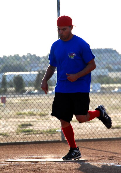The top players in this year's intramural softball league play aainst one another in the All-Star Game Oct. 27, 2010.  The East team won against the West team with a score of 14-10.  The SSI team beat the Security Forces team in both games of the championship held Oct. 19 and Oct. 26 (continuing with extra innings on Oct. 28).  The scores of the games were 4-3 and 19-18.  Although SSI earned the title of base champions, the Security Forces team was the league champion for the best record during the season.  (U.S. Air Force photos/ Henry Kim)