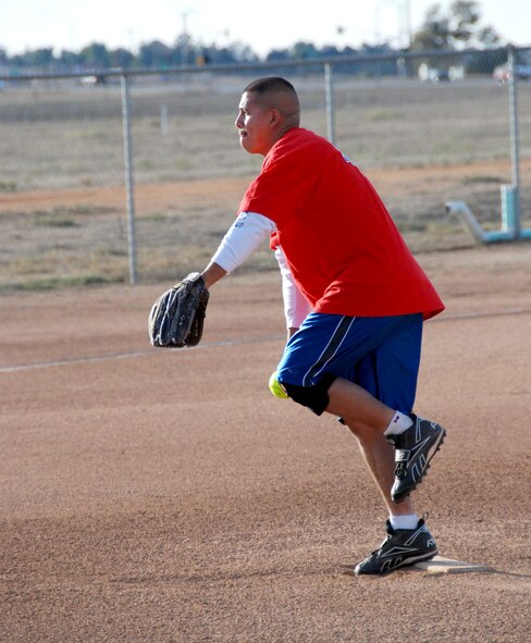 The top players in this year's intramural softball league play aainst one another in the All-Star Game Oct. 27, 2010.  The East team won against the West team with a score of 14-10.  The SSI team beat the Security Forces team in both games of the championship held Oct. 19 and Oct. 26 (continuing with extra innings on Oct. 28).  The scores of the games were 4-3 and 19-18.  Although SSI earned the title of base champions, the Security Forces team was the league champion for the best record during the season.  (U.S. Air Force photos/ Henry Kim)