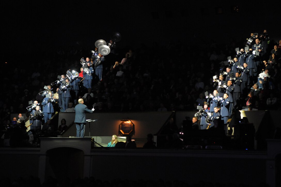 Major Scott Guidry conducts the Ceremonial Brass as part of The United States Air Force Band's holiday concerts at DAR Constitution Hall. For this year's holiday performances, the Concert Band, Singing Sergeants, and Ceremonial Brass joined forces to offer over 10,000 attendees "The Best Gift of All." (U.S. Air Force photo by Senior Airman Christopher Ruano) 