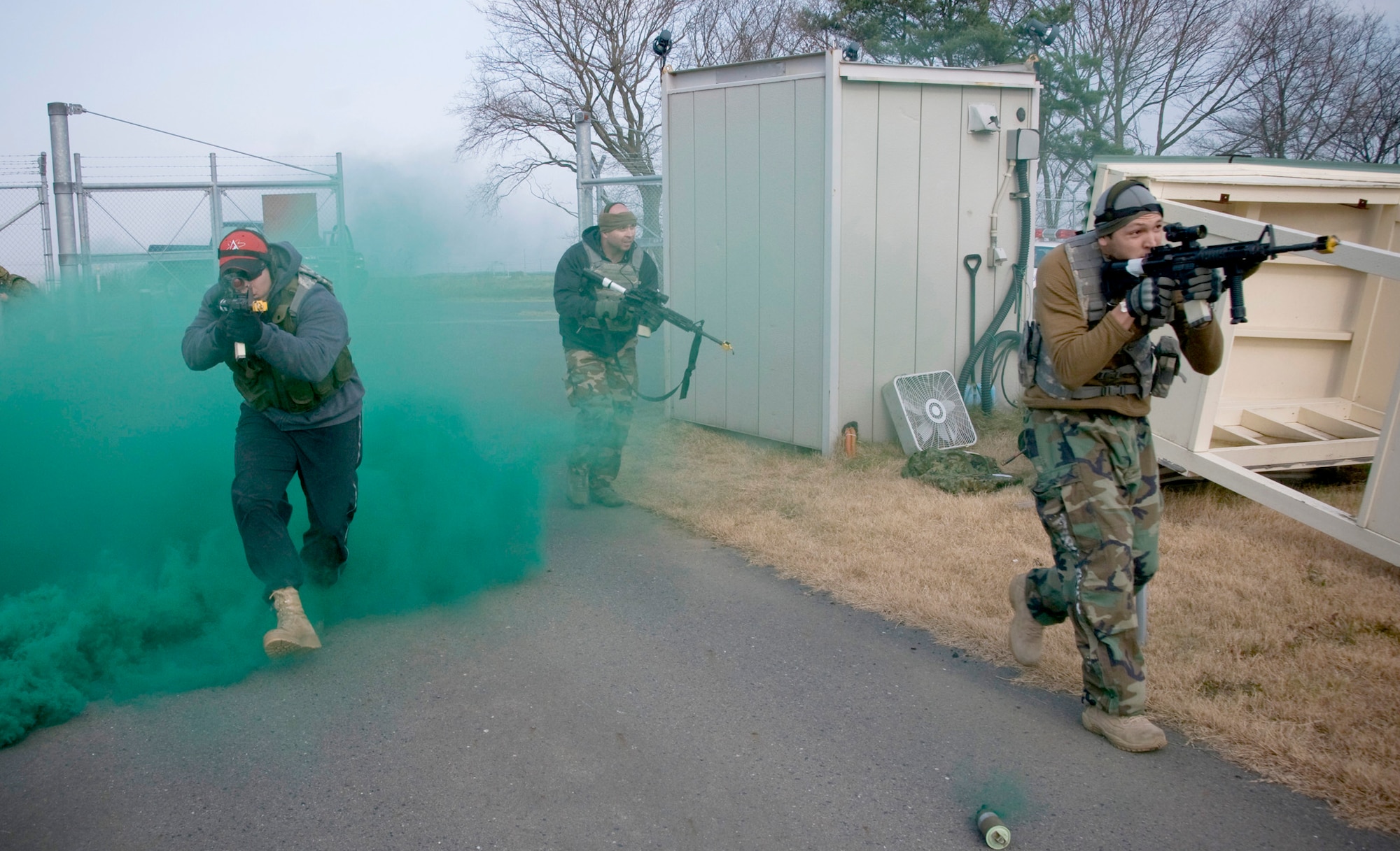 Senior Airman Kevin Gonzales searches Senior Airman William Holliday during a bilateral guard and protect exercise Dec. 4, 2010, at Misawa Air Base, Japan. Opposing forces simulated hostile enemy actions against Japan Ground Self-Defense Force, Air Self-Defense Force and the 35th Security Forces members during the exercise to test the combined force's ability to protect Misawa AB's war-fighting assets. Airman Gonzales is a 35th SFS patrolman 3and Airman Holliday is from the 5th Civil Engineer Squadron Explosive Ordnance Disposal flight and opposing forces volunteer. (U.S. Air Force photo/Senior Airman Jessica Lockoski)
