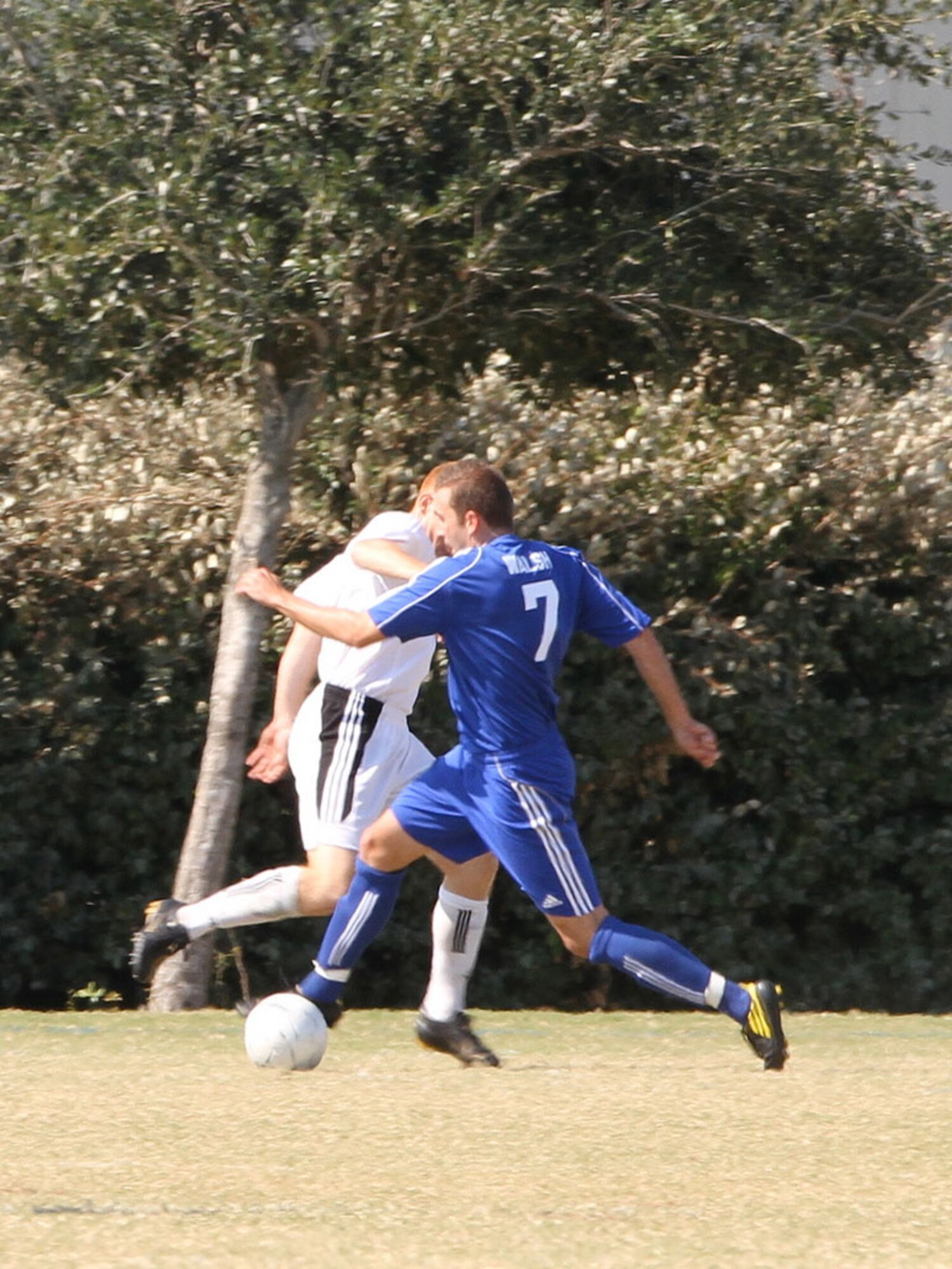 Capt. Dan Walsh (right) defends against an Army soccer player during the U.S. Armed Forces Championship in Destin, Fla., in October. After the U.S. championship, Captain Walsh was selected to play for the U.S. Armed Forces team in Suriname, South America, in November. (Courtesy photo) 