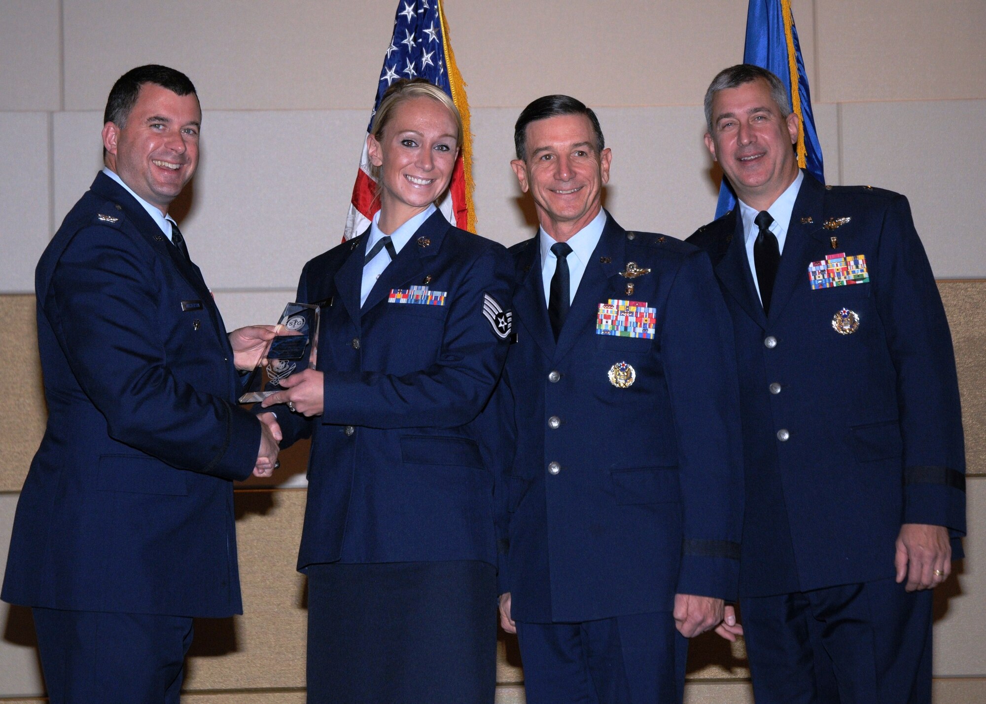 Staff Sgt. Sammy Jefferey received the 2009 Outstanding Aerospace Medicine Non-Commissioned Officer of the Year for Air Force Reserve Command.  She poses here with (left to right) Colonel Brian Masterson, the Air Force Deputy Surgeon General, Staff Sgt. Jefferey, Maj. Gen. (Dr.) Byron Hepburn, Air Force Deputy Surgeon General and Brig. Gen. Daniel P. Gillen, mobilization assistant to the Deputy Surgeon General.