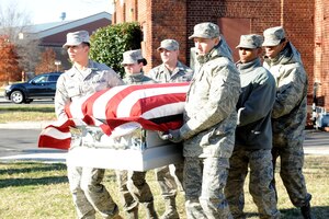 LANGLEY AIR FORCE BASE, Va. – Langley Honor Guard Airmen practice carrying the casket in windy and cold weather Dec. 7. The honor guard practices daily, carrying the mission of representing Airmen to the American public and the world. (U.S. Air Force photo/Airman 1st Class Racheal Watson)(RELEASED)