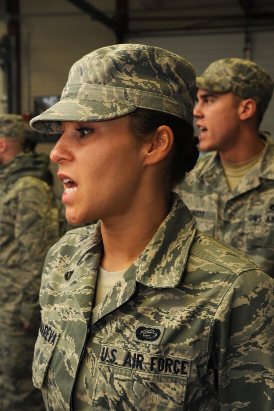 LANGLEY AIR FORCE BASE, Va. – Airman 1st Class Snezhana Ponomareua, 633d Force Support Squadron outbound assignment personnelist, falls out of honor guard formation Dec. 7. Langley honor guard practices daily, carrying the mission of representing Airmen to the American public and the world. (U.S. Air Force photo/Airman 1st Class Racheal Watson)(RELEASED)