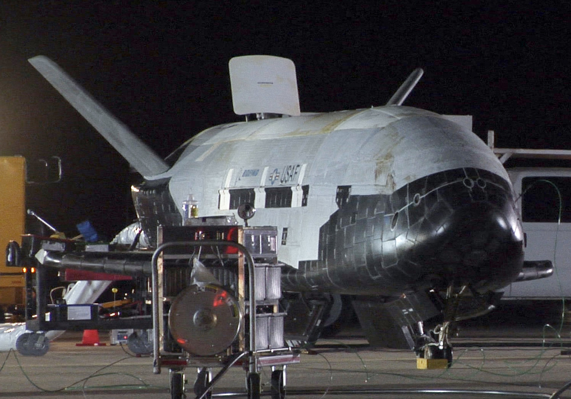 The Air Force's first unmanned re-entry spacecraft, X-37B Orbital Test Vehicle, landed at 1:16 a.m. Dec. 3, 2010, at Vandenberg Air Force Base, Calif.  The X-37B conducted on-orbit experiments for more than 220 days during its maiden voyage. (U.S. Air Force photo/Michael Stonecypher)