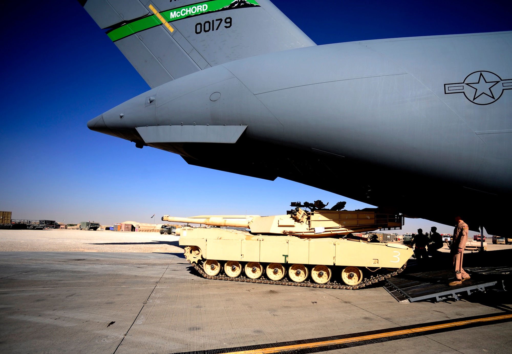 A C-17 Globemaster III delivers a Marine Corps M1A1 Abrams tank to Afghanistan Nov. 28, 2010, in support of Operation Enduring Freedom. The Globemaster is assigned to the 816th Expeditionary Airlift Squadron at an air base in Southwest Asia.                                 (U.S. Air Force photo/Staff Sgt. Andy M. Kin)
