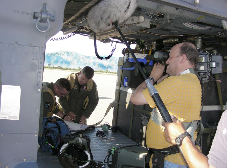 Air Force Reserve combat search and rescue Airmen are featured in a newly released documentary titled, "The Taliban Gambit," for their heroic actions. The documentary will air on the Smithsonian Channel. Here the film team, captures Lt. Col. Jeffrey Peterson, before a high-altitude mission in the desert. (U.S. Air Force photo/Capt. Cathleen Snow)