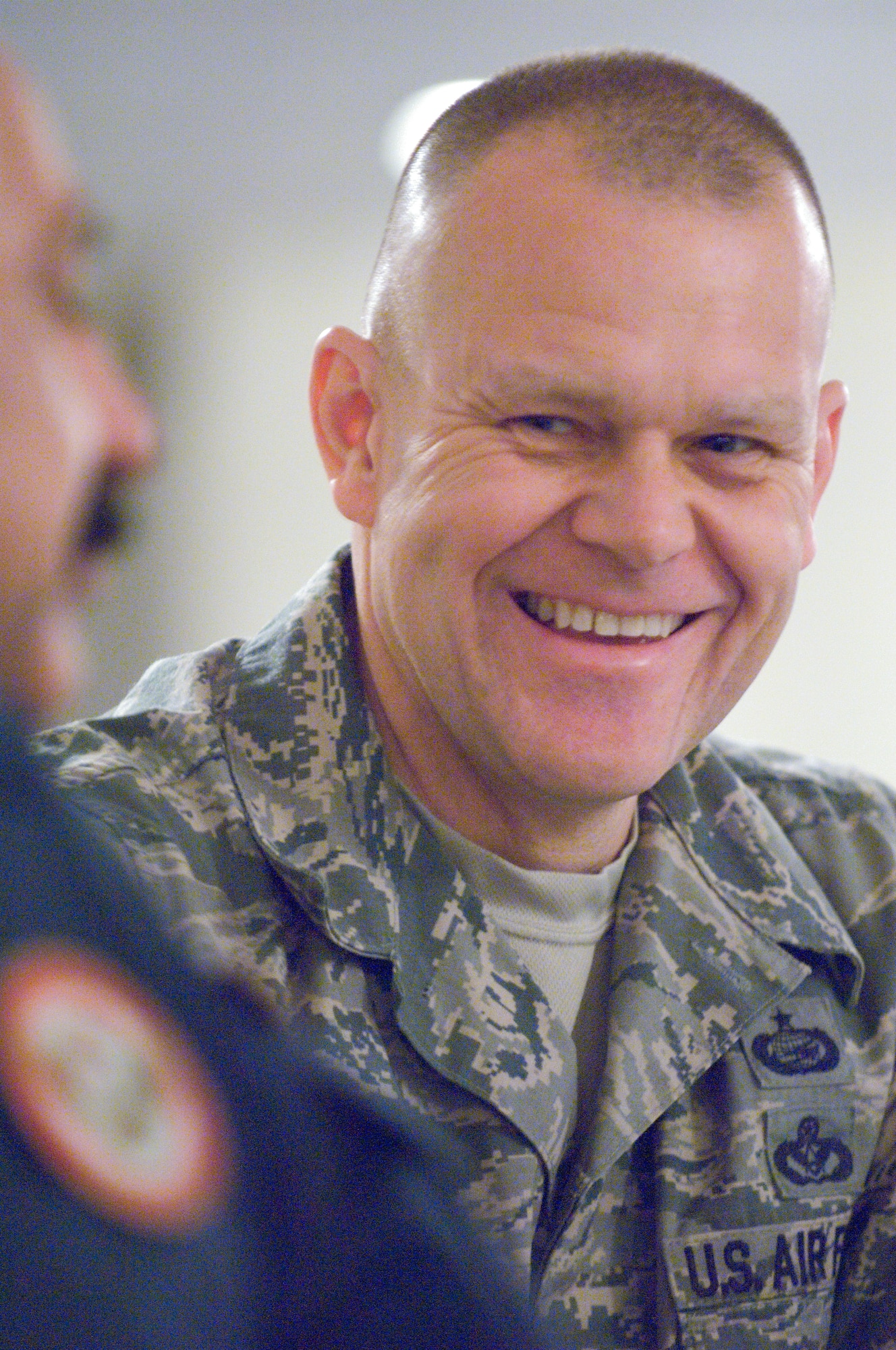 Chief Master Sgt. of the Air Force James Roy laughs with his counterpart, the Iraqi chief master sergeant of the Air Force, during lunch Dec. 7 at Maxwell Air Force Base, Ala. The Iraqi chief was in the States for the first time, visiting Air University and other Air Education and Training Command bases to observe and glean ideas concerning how the U.S. Air Force educates and trains its Airmen for the duration of their careers. (U.S. Air Force photo/Melanie Rodgers Cox)
