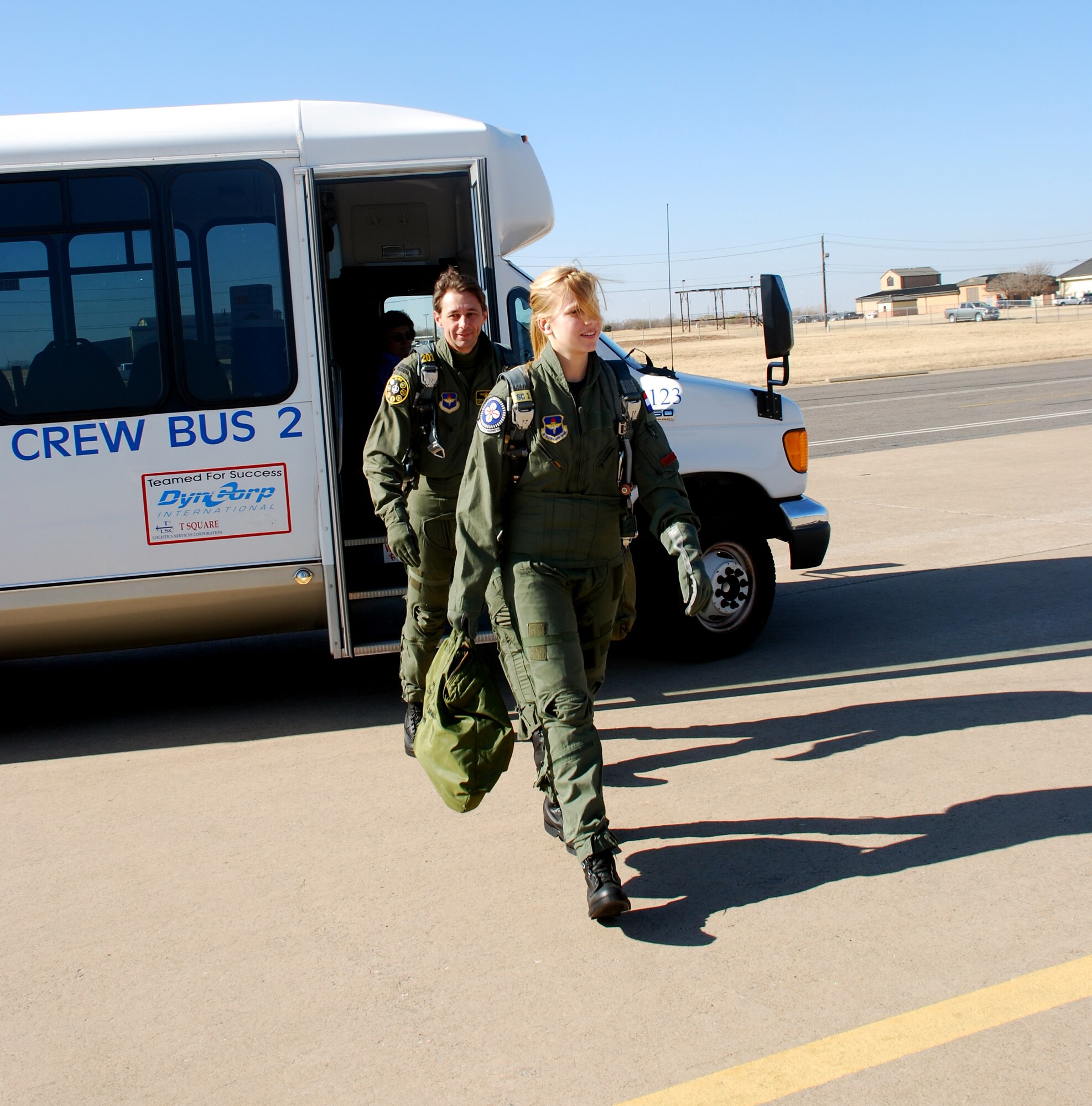 Marieke van Gaalen, front, and Royal Netherlands air force Capt. Ronald van Steijn walk out to a T-38C Talon Dec. 8 for a flight over North Texas and Southern Oklahoma. Ms. van Gaalen was awarded the flight from the Air Force ROTC detachment at the University of North Texas in Denton after she amassed the most points for recruiting efforts. She is a student of international studies at Midwestern State University in Wichita Falls, Texas. (U.S. Air Force photo/John Ingle)