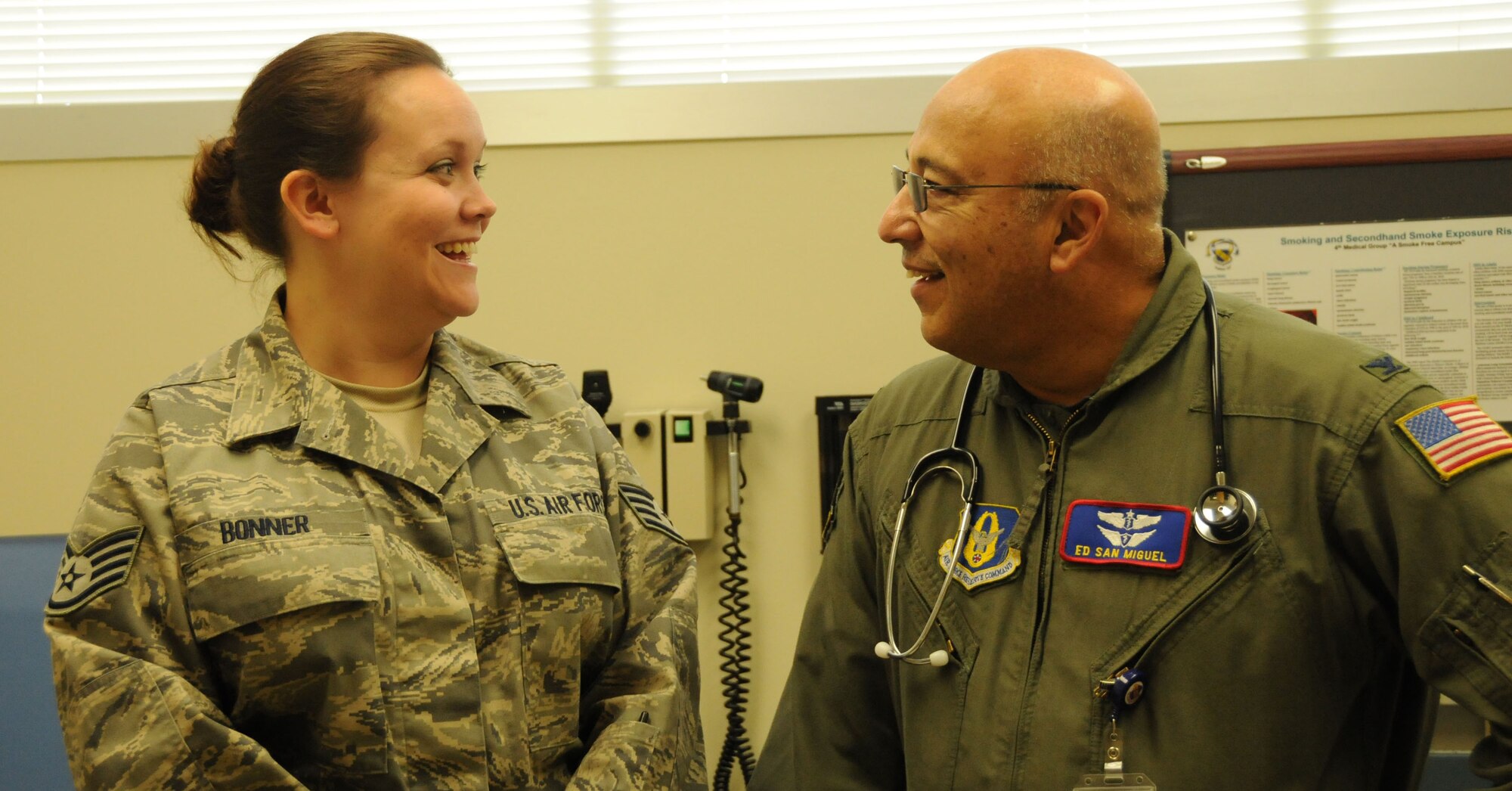 Col. Ed San Miguel, a flight surgeon with 916th Aerospace Medicine Flight talks with Staff Sgt. Ashley Bonner during the December unit training assembly. Dr. San Miguel pinned on the rank of colonel in November. (USAF photo by SSgt. Terrica Jones, 916 ARW/PA)