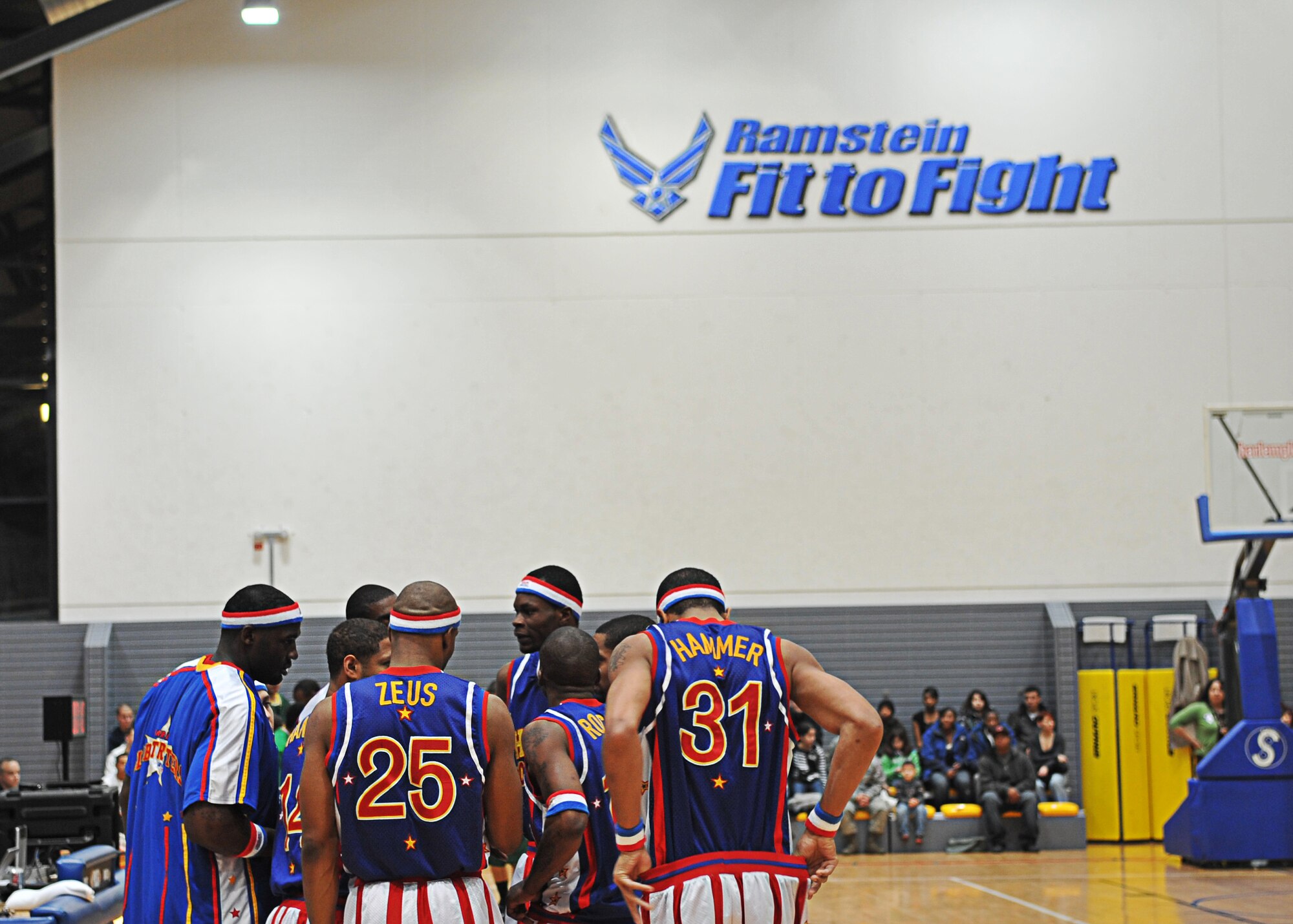 The Harlem Globetrotters performed for military members and their families during their ninth Military Holiday tour, Ramstein Air Base, Germany, Dec. 8, 2010. This tour was made possible by Navy Entertainment and Armed Forces Entertainment; this year's tour will feature 11 games on U.S. military bases in five countries: Germany, Italy, Greece, the Netherlands and the United Kingdom. The Globetrotters are celebrating their 85th year entertaining audiences around the world. (U.S. Air Force photo by Airman 1st Class Desiree Esposito)