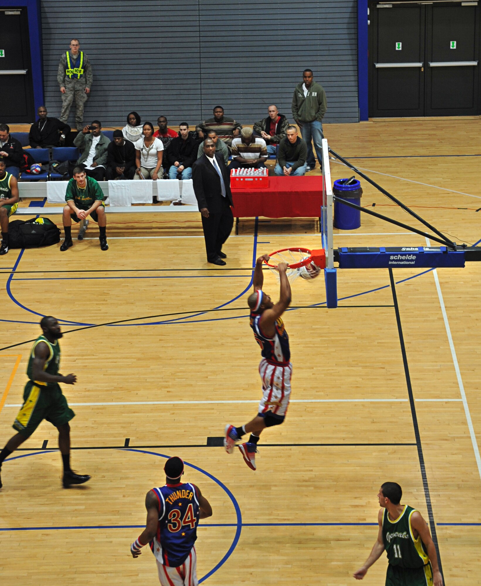 The Harlem Globetrotters performed for military members and their families during their ninth Military Holiday tour, Ramstein Air Base, Germany, Dec. 8, 2010.This tour was made possible by Navy Entertainment and Armed Forces Entertainment; this year's tour will feature 11 games on U.S. military bases in five countries: Germany, Italy, Greece, the Netherlands and the United Kingdom. The Globetrotters are celebrating their 85th year entertaining audiences around the world. (U.S. Air Force photo by Airman 1st Class Desiree Esposito)