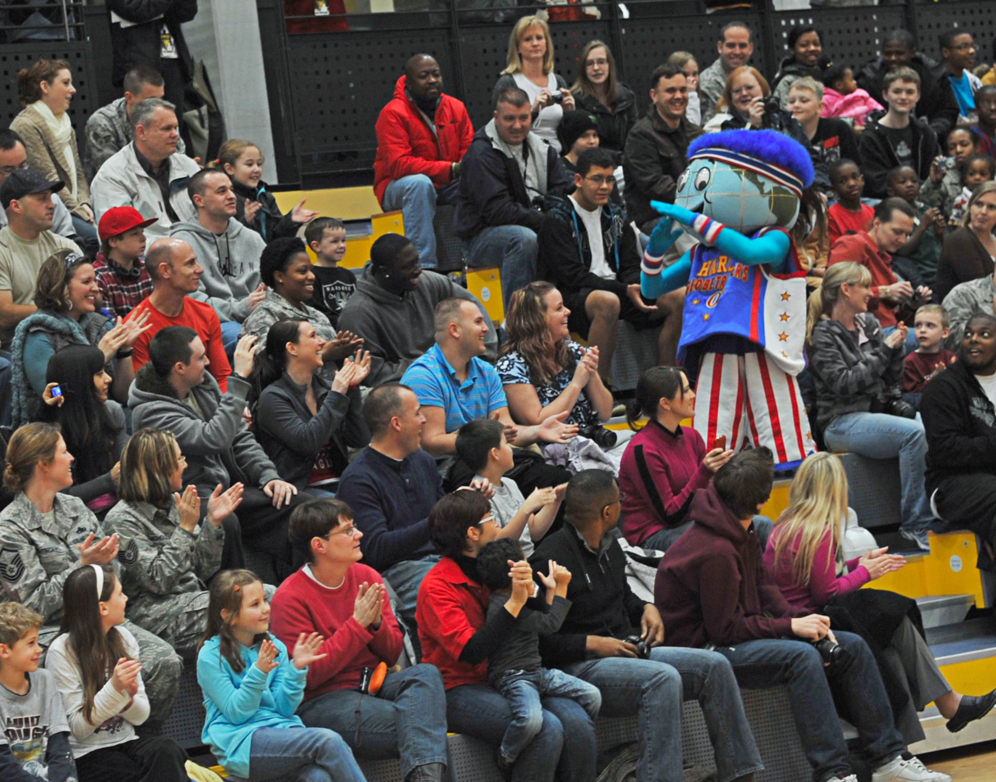 Globie,  the Harlem Globetrotters mascot entertains the crowd before the game, Ramstein Air Base, Germany, Dec. 8, 2010.The Globetrotters are celebrating their 85th year entertaining audiences around the world. (U.S. Air Force photo by Airman 1st Class Desiree Esposito)