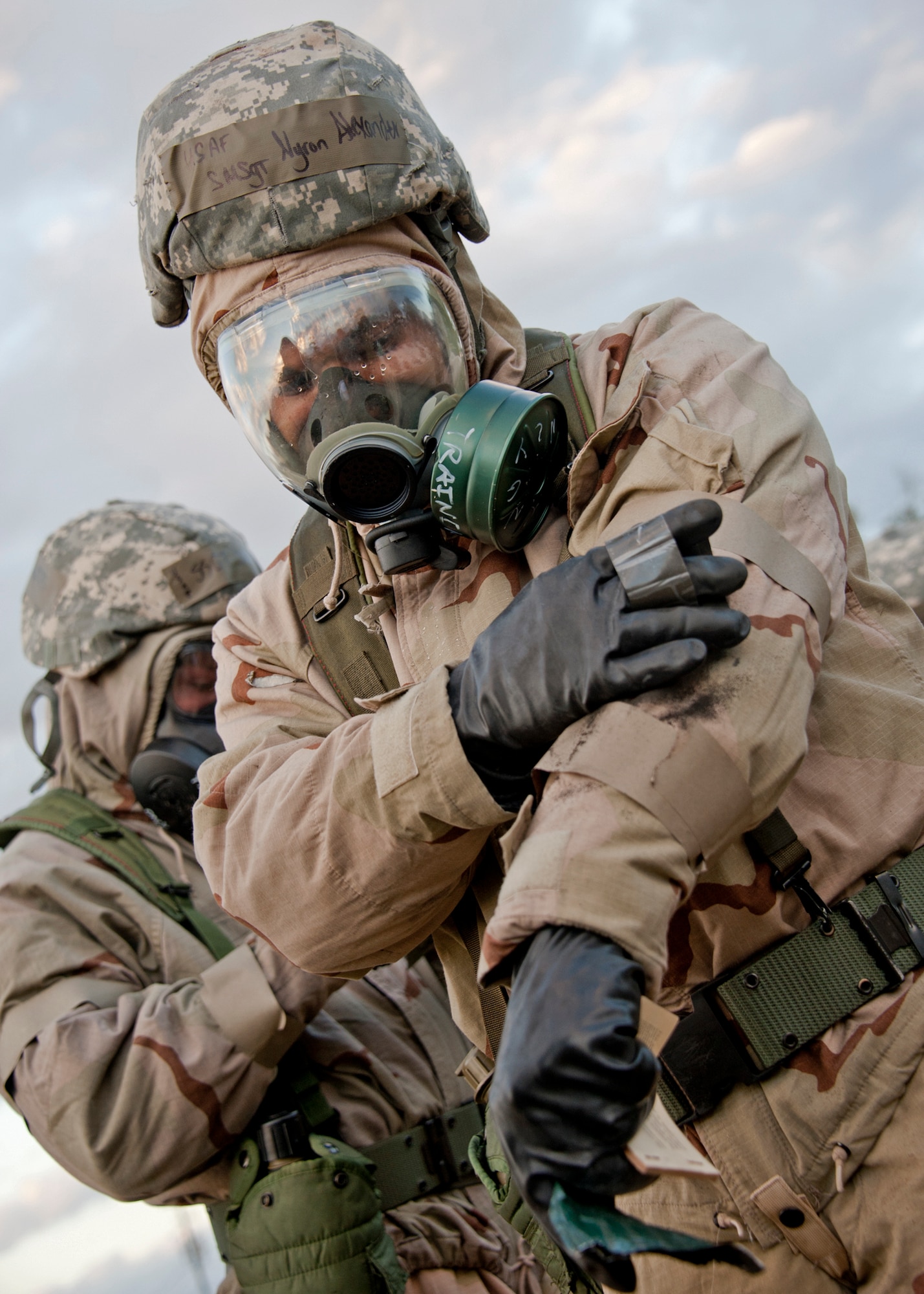 Senior Master Sgt. Nyron Alexander, 96th Force Support Squadron, decontaminates himself with an M-291 decon kit during the chemical, biological, radiological, nuclear and explosive training course at Eglin Air Force Base, Fla.  The eight-hour course combines computer based and hands-on training on how and when to wear the gear, unxploded ordnances and protective measures.  The 96th Civil Engineer Squadron’s emergency readiness flight teaches the hands-on course up to 75 times a year.  (U.S. Air Force photo/ Samuel King Jr.)