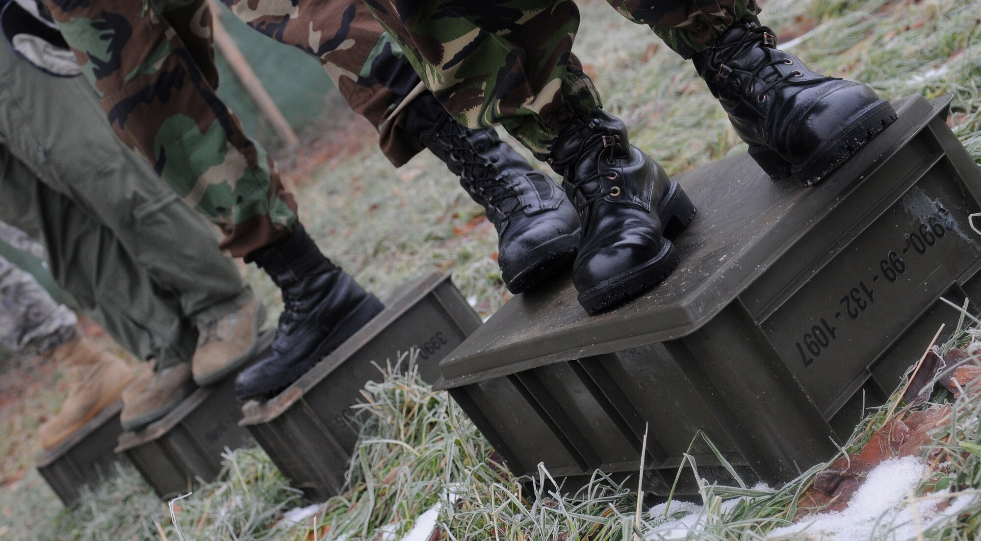 RAF MARHAM, England -- U.S. and British Airmen from RAFs Mildenhall and Marham participate in a team building exercise during Leader, Ethos and Air Power Training Day here Dec. 6, 2010. Participants were broken into 16 teams that performed various tasks competing against each other for points. (U.S. Air Force photo/Senior Airman Tabitha M. Lee) 