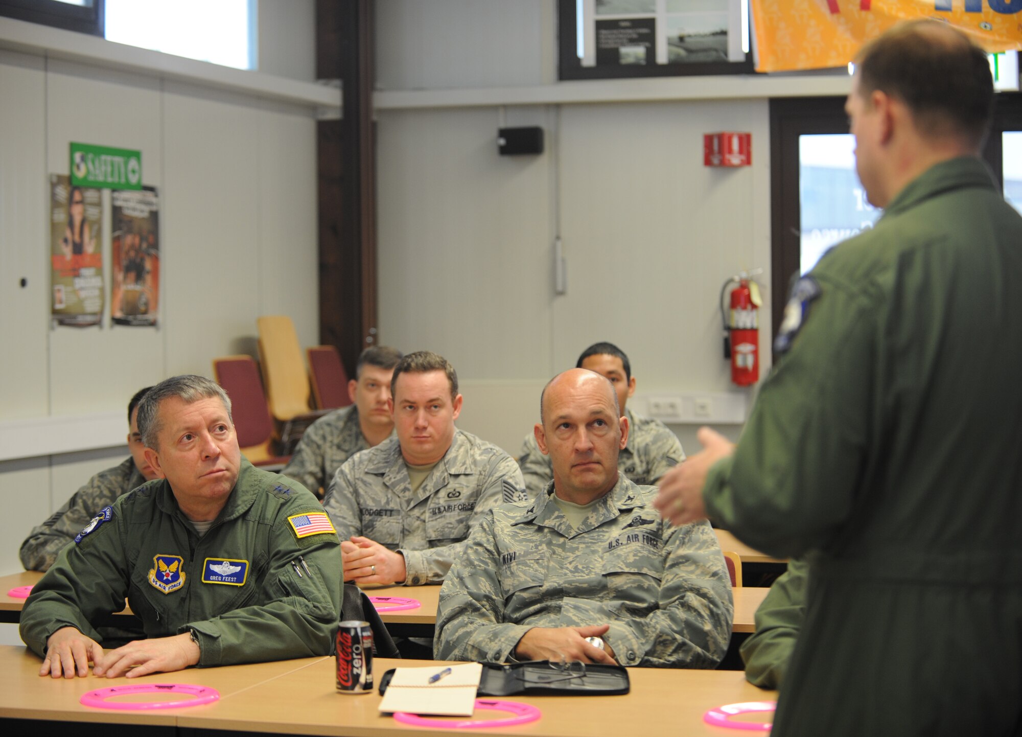 SPANGDAHLEM AIR BASE, Germany – Maj. Gen. Gregory Feest, Air Force chief of safety, left, and Col. Eric Kivi, Air Force chief of aviation safety, listen to Lt. Col.  John Vincent, 52nd Fighter Wing chief of safety, brief the Saber Driving Program during a visit to the 52nd Fighter Wing Dec. 8. General Feest visited the base for a day with Col. Eric Kivi, Air Force chief of aviation safety, and Col. Steven Vlasek, U.S. Air Forces in Europe chief of safety, to assess the wing’s driver safety programs and attended a USAFE Safety Summit at Ramstein Air Base where they discussed traffic safety programs and other safety challenges within the command. The general commended Spangahlem’s safety office and the wing for their continued efforts to provide the education and skills necessary to keep Spangdahlem’s and USAFE’s Airmen safe.  (U.S. Air Force photo/Senior Airman Nick Wilson)