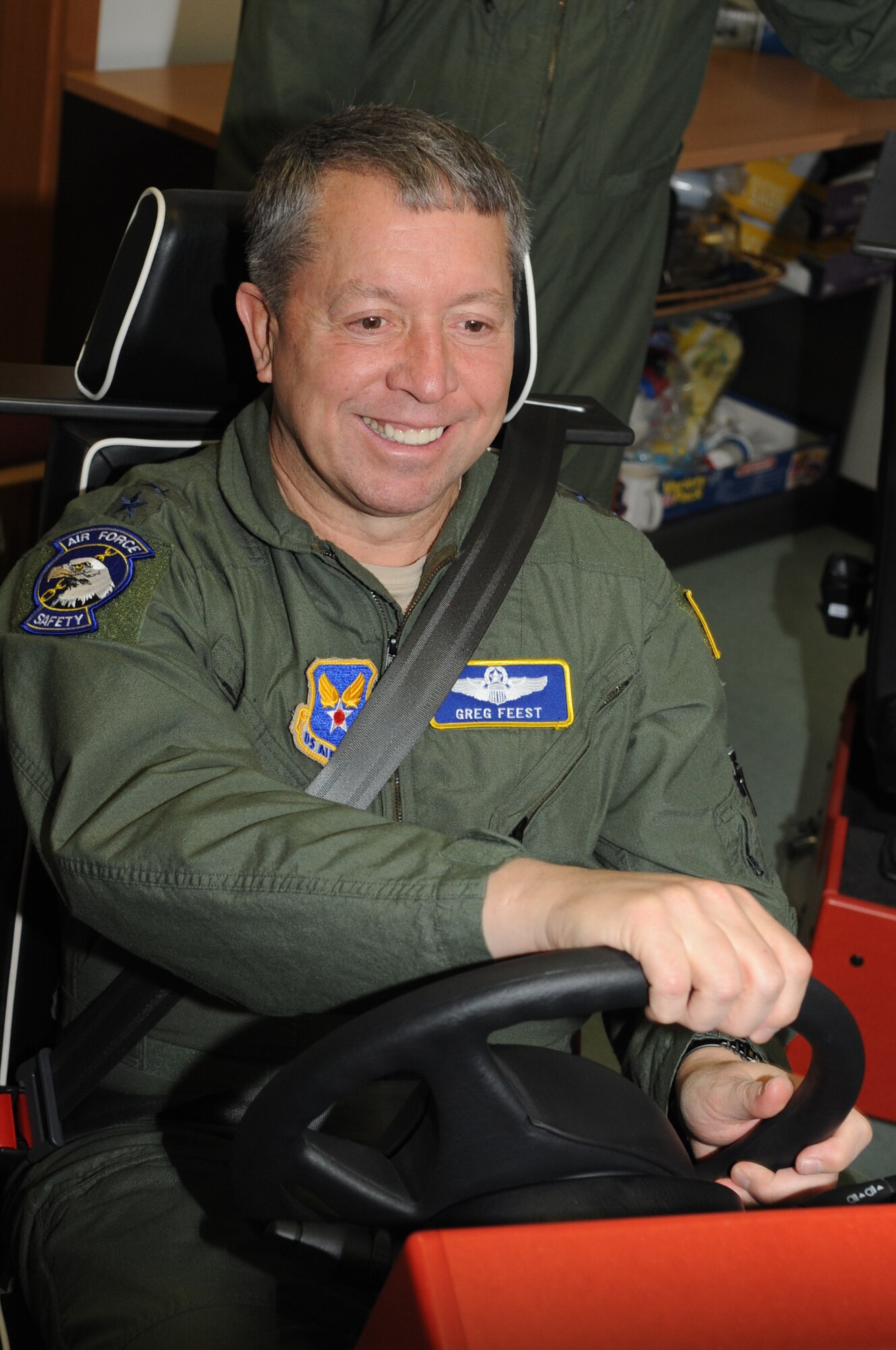 SPANGDAHLEM AIR BASE, Germany – Maj. Gen. Gregory Feest, Air Force chief of safety, tests out the driving simulator during a visit to the 52nd Fighter Wing Dec. 8. General Feest visited the base for a day with Col. Eric Kivi, Air Force chief of aviation safety, and Col. Steven Vlasek, U.S. Air Forces in Europe chief of safety, to assess the wing’s driver safety programs and attended a USAFE Safety Summit at Ramstein Air Base where they discussed traffic safety programs and other safety challenges within the command. The general commended Spangahlem’s safety office and the wing for their continued efforts to provide the education and skills necessary to keep Spangdahlem’s and USAFE’s Airmen safe.  (U.S. Air Force photo/Senior Airman Nick Wilson)