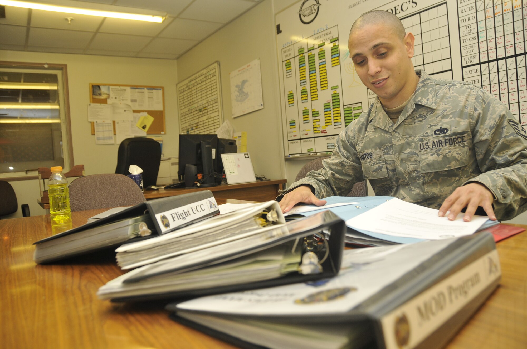 ROYAL AIR FORCE LAKENHEATH--Staff Sgt. Rafael Santos-Montanez, 48th Equipment Maintenance Squadron fabrication flight training and program monitor, reviews program folders Dec 7. Sergeant Santos-Montanez was nominated for a Liberty Spotlight because he displayed the core value of 'Service before Self'. (U.S. Air Force photo/Airman 1st Class Eboni Reams)