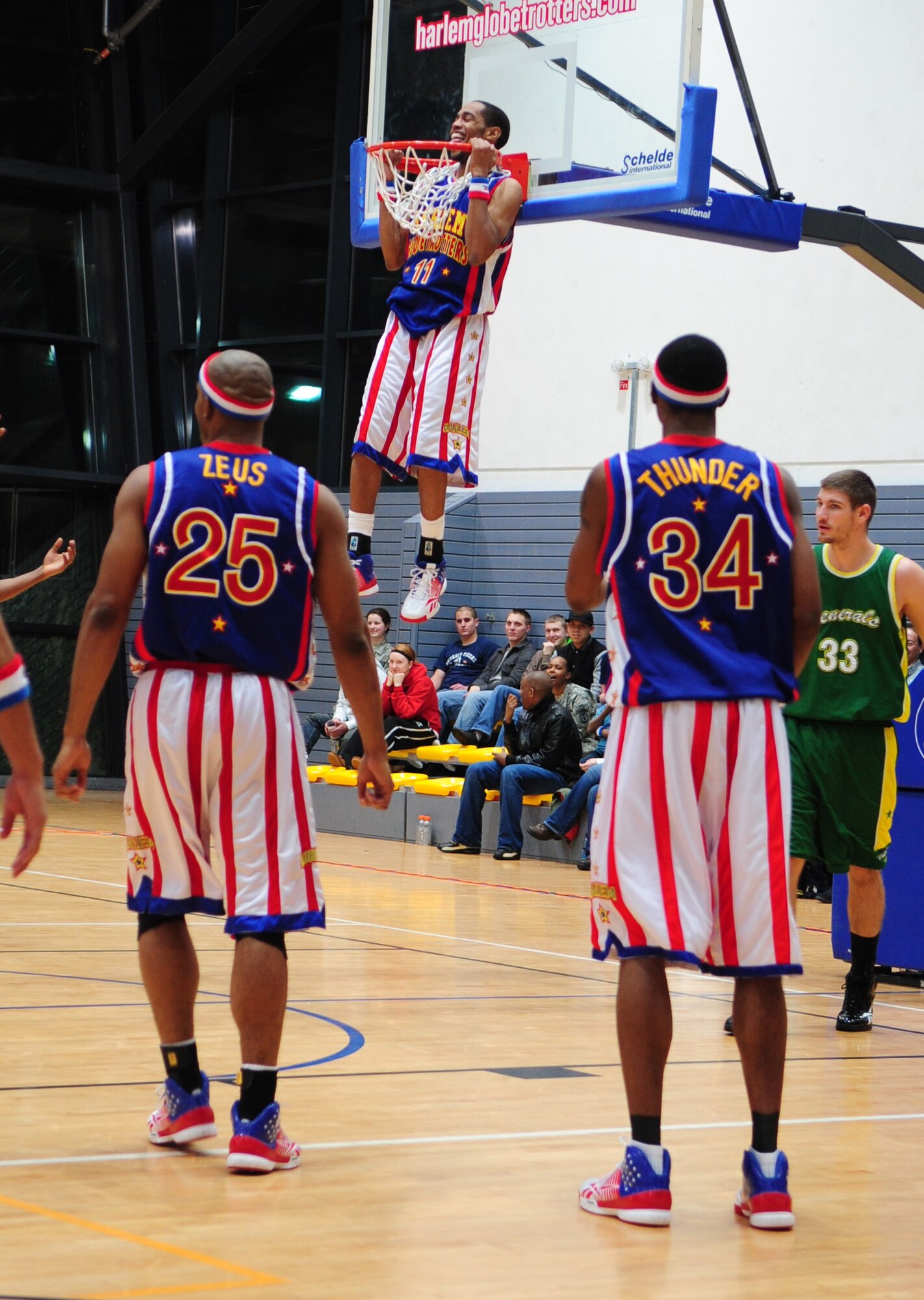 The Harlem Globetrotters performed for military members and their families during their ninth Military Holiday tour, Ramstein Air Base, Germany, Dec. 8, 2010. This tour was made possible by Navy Entertainment and Armed Forces Entertainment; this year's tour will feature 11 games on U.S. military bases in five countries: Germany, Italy, Greece, the Netherlands and the United Kingdom.  The Globetrotters are celebrating their 85th year entertaining audiences around the world. (U.S. Air Force photo by Senior Airman Brittany Nicole Perry)