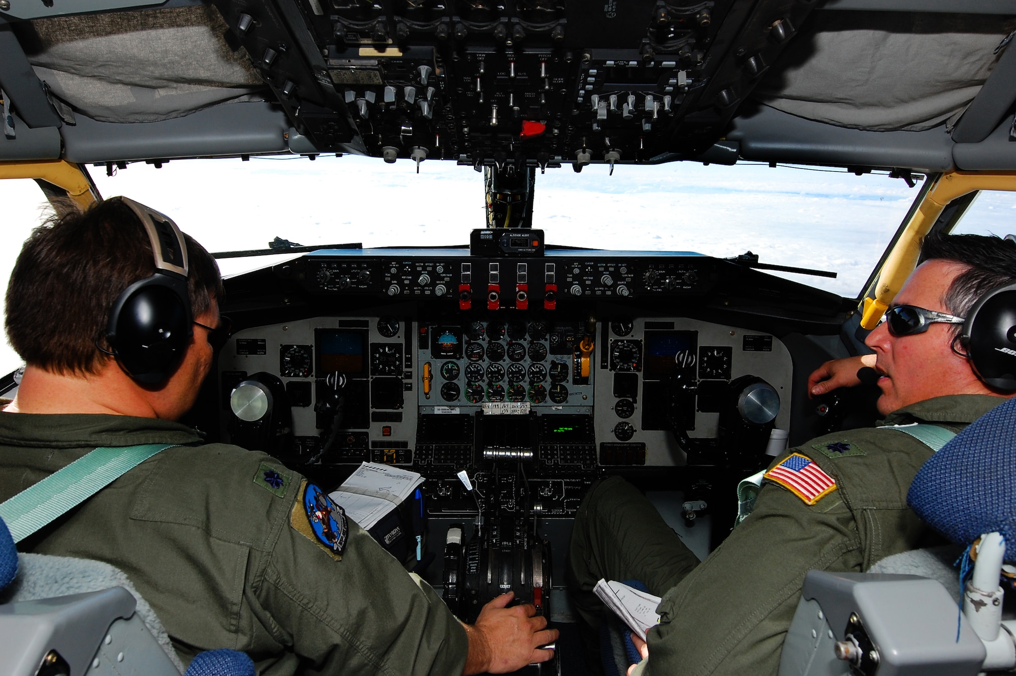 Lt.Col. Ken Carmichael (left) and Lt. Col. Cam Sanders, both pilots with the 185th Air Refueling Squadron, Oklahoma Air National Guard, Tinker Air Force Base discuss the overall flight plan during the Keen Sword exercise here at Kadena Air Base, Japan, Dec. 8. Scheduled for December 3-10, Keen Sword 2011 is the tenth joint-bilateral field training exercise since 1986 involving Japan Self-Defense Forces and United States military forces and will cap the 50th anniversary of the Japan-U.S. alliance as an "alliance of equals". ( U.S. Air Force photo/ Staff Sgt. Lakisha A. Croley)
