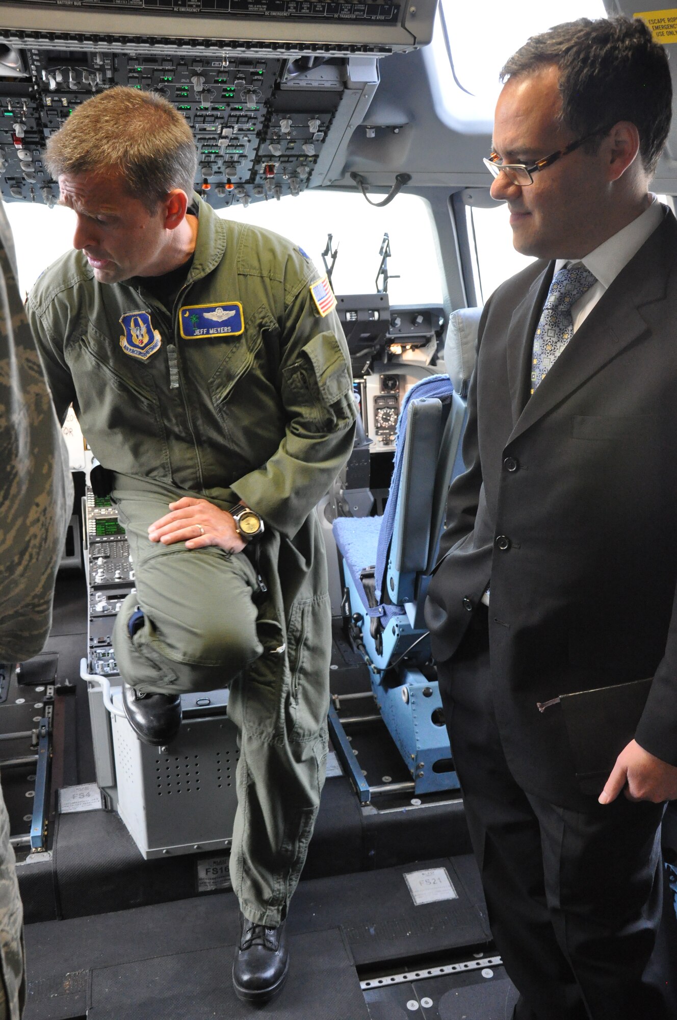 Lt. Col Jeff Meyers, 315th Operations Group chief of Stan/Eval, explains flight deck operations aboard the C-17 Globemaster III aircraft to Secretary Daniel Ginsberg,  Assistant Secretary of the Air Force for Manpower and Reserve Affairs, during an official visit to Joint Base Charleston, S.C. Dec. 4, 2010. (U.S. Air Force photo/Senior Airman Robert Pilch) 
