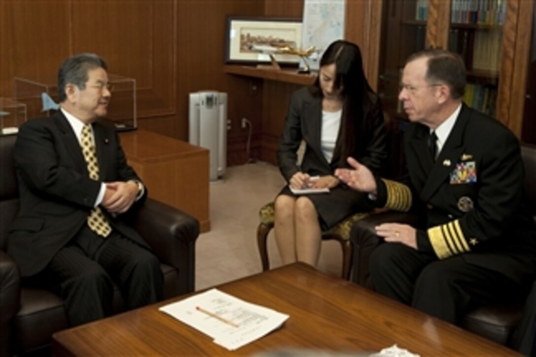 Chairman of the Joint Chiefs of Staff Adm. Mike Mullen speaks with Japanese Defense Minister Toshimi Kitazawa in Tokyo, Japan, on Dec. 9, 2010.  Mullen traveled to Japan to meet with defense officials reassuring the strength of the U.S.-South Korean alliance amid escalating tensions on the Korean Peninsula.  