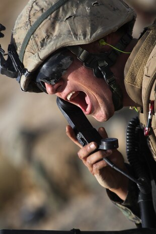 Second Lt. Paul Harper, a student with Marine Corps Base Quantico, Va.’s Infantry Officer Course,, shouts commands to other lieutenants while they train aboard Combat Center Range 205 Dec. 10, 2010. The IOC ileft the Combat Center Dec. 14, 2010, and graduated back at Quantico Dec. 17, 2010. ::r::::n::