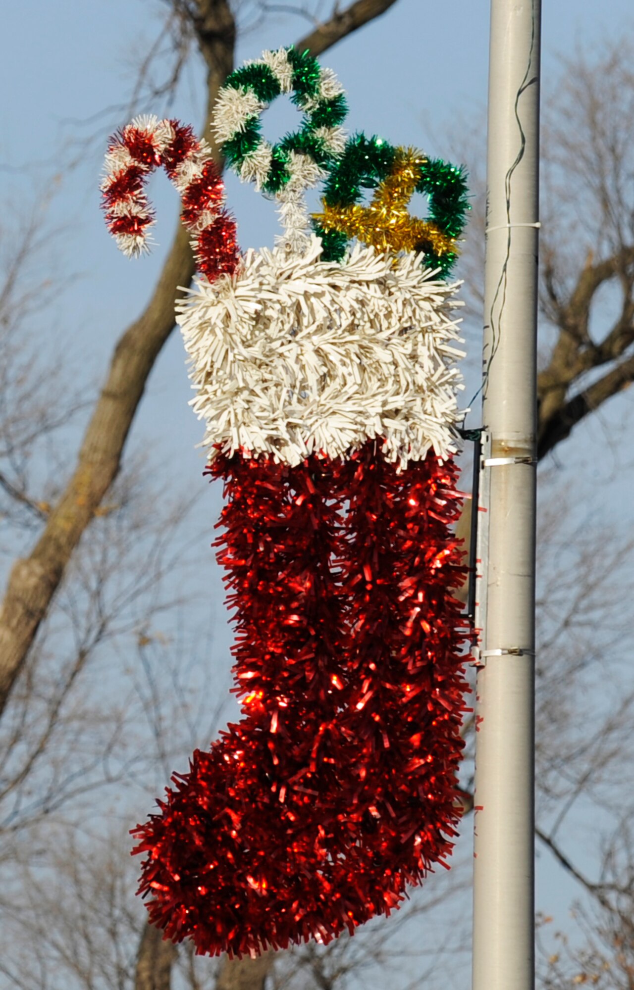 A stocking decoration is hung on a street light on Scott Drive Dec. 10.  Scott Air Force Base takes pride in decorating for the holiday season. (U.S. Air Force photo/ Staff Sgt. Ryan Crane)