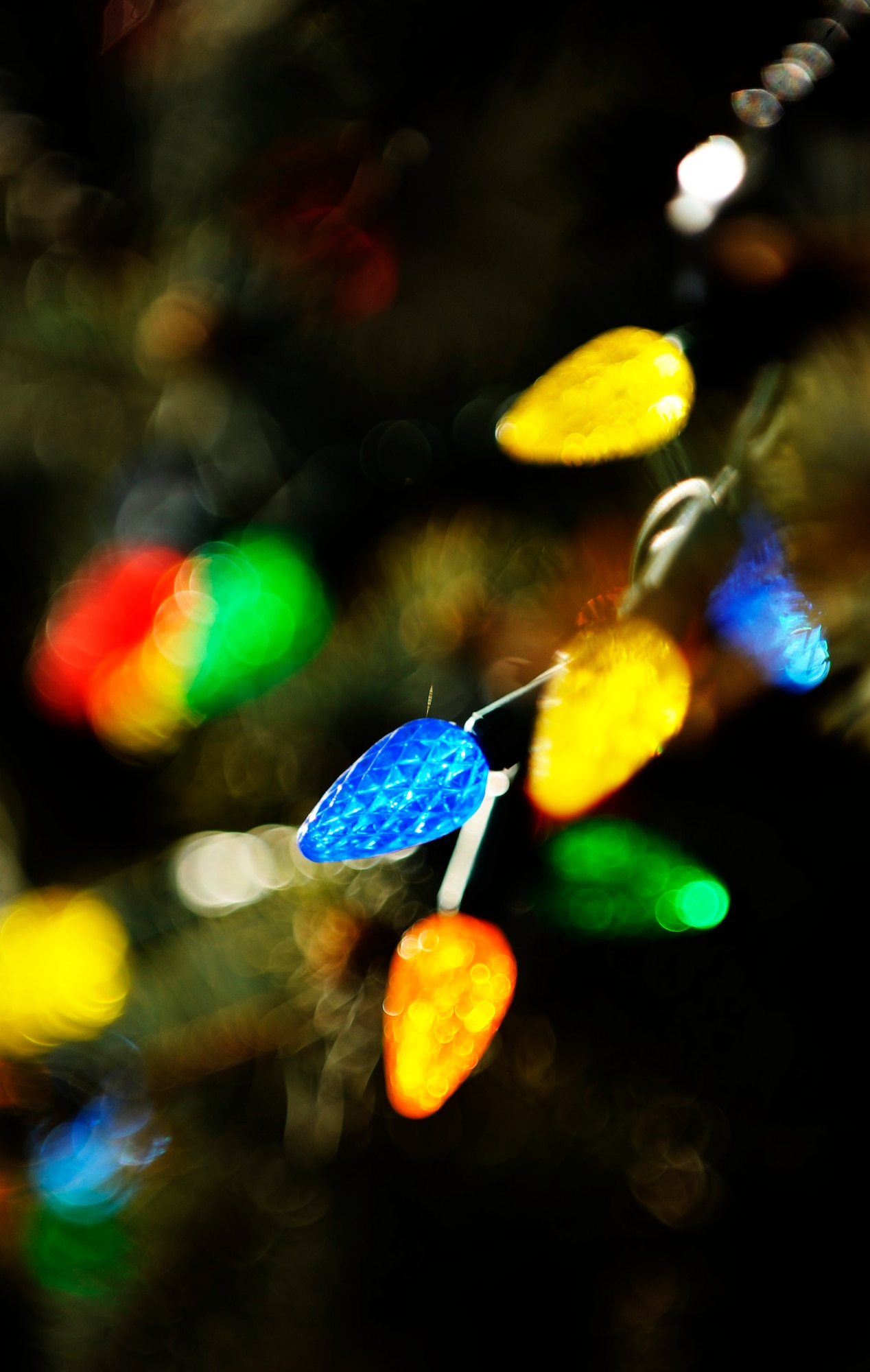 Christmas lights are hung on a tree displayed outside of the base chapel in recognition of Christmas Dec. 10.  Scott Air Force Base takes pride in decorating for the holiday season. (U.S. Air Force photo/ Staff Sgt. Ryan Crane)