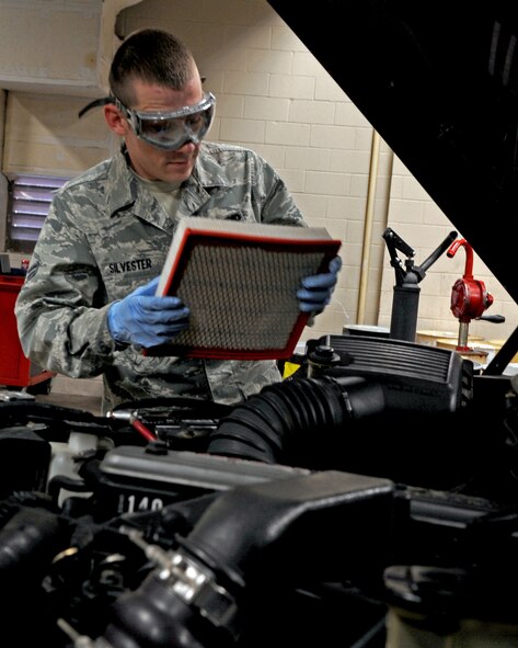 Airman 1st Class Scott Silvester, 2nd Logistic Readiness Squadron vehicle and equipment maintenance apprentice, removes the filter from a Dodge Bobtail during an overall inspection on Barksdale Air Force Base, La., Dec. 10. An overall inspection consists of fluid checks, hoses, corrosion and visual. The 2 LRS vehicle maintenance facility is responsible for more than 800 of Barksdale's government vehicles. (U.S. Air Force Photo/Senior Airman La'Shanette V. Garrett)(RELEASED)