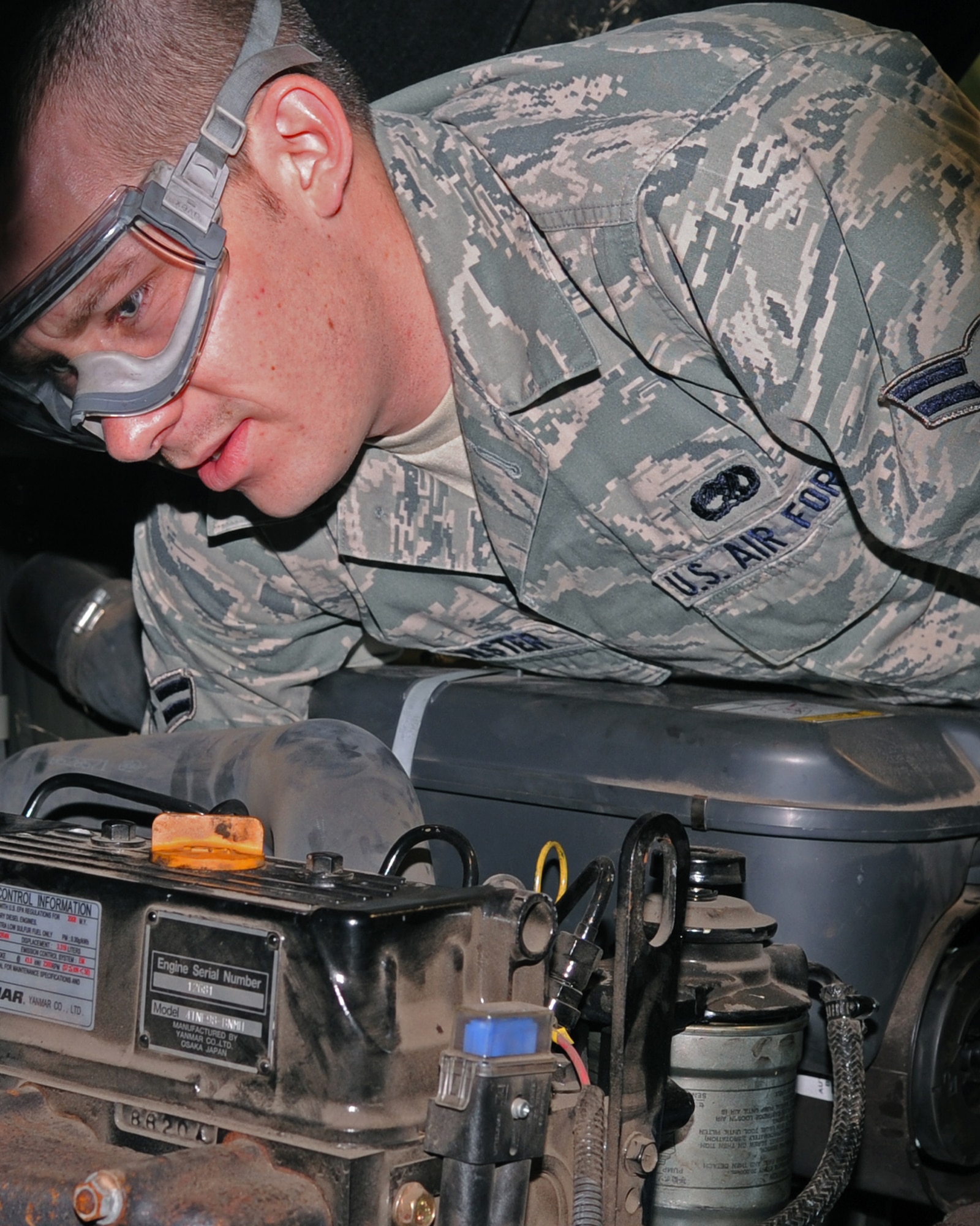 Airman 1st Class Scott Silvester, 2nd Logistic Readiness Squadron vehicle and equipment maintenance apprentice, performs an overall inspection of a Hyster forklift on Barksdale Air Force Base, La., Dec. 10. An overall inspection consists of fluid, hose, corrosion and visual checks. The 2 LRS vehicle maintenance facility is responsible for more than 800 of Barksdale's government vehicles. (U.S. Air Force Photo/Senior Airman La'Shanette V. Garrett)(RELEASED)