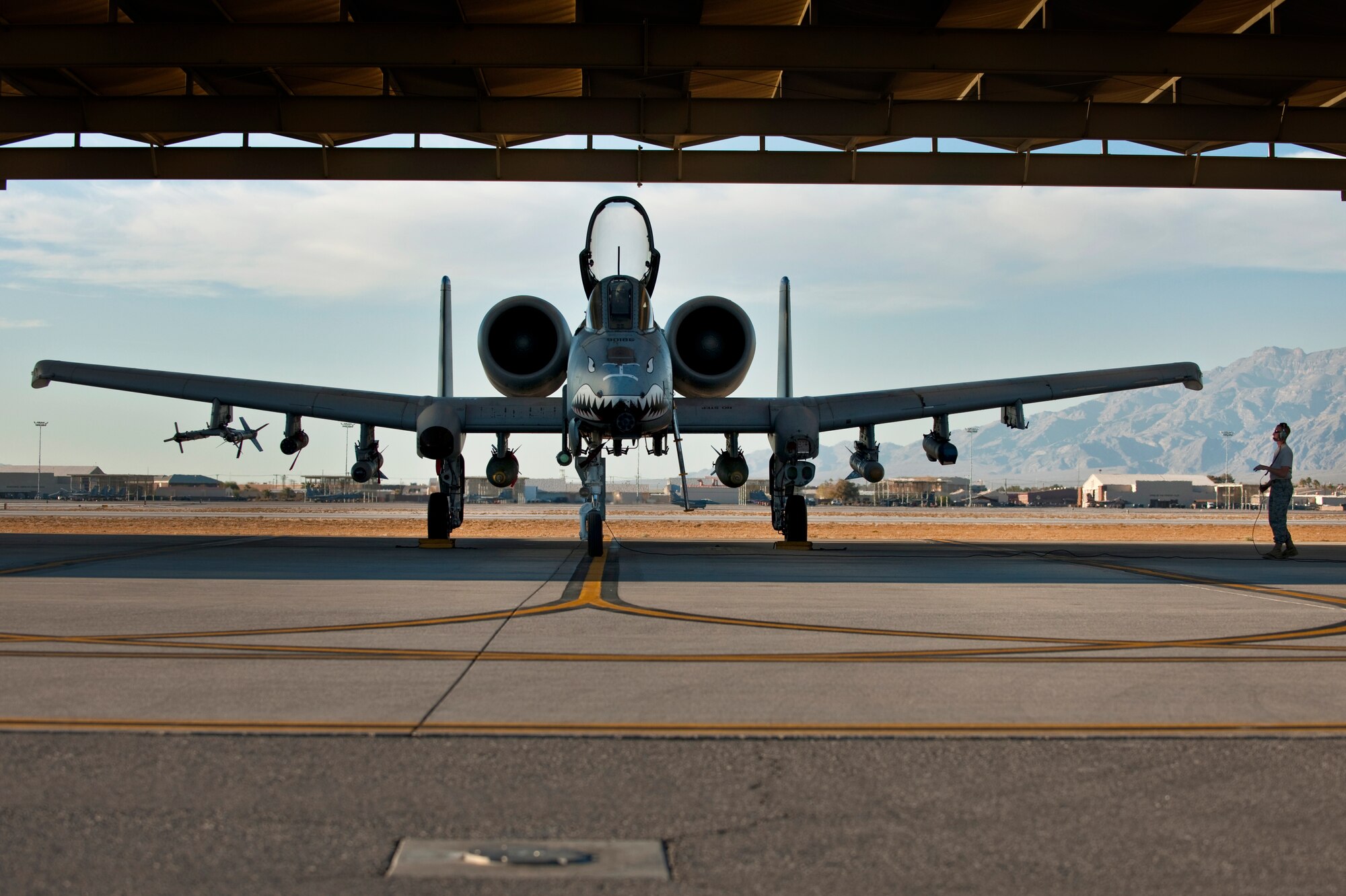 NELLIS AIR FORCE BASE, Nev. -- Staff Sgt. Jamie Case, a crew chief with the 23rd Aircraft Maintenance Squadron from Moody Air Force Base, Ga., conducts pre-flight checks on an A-10 Thunderbolt II before a training mission during the Green Flag West 11-2 exercise at Nellis Dec. 6. Green Flag-West provides a realistic air-land integration training environment for forces preparing to support worldwide combat operations. (U.S. Air Force photo by Tech. Sgt. Michael R. Holzworth)