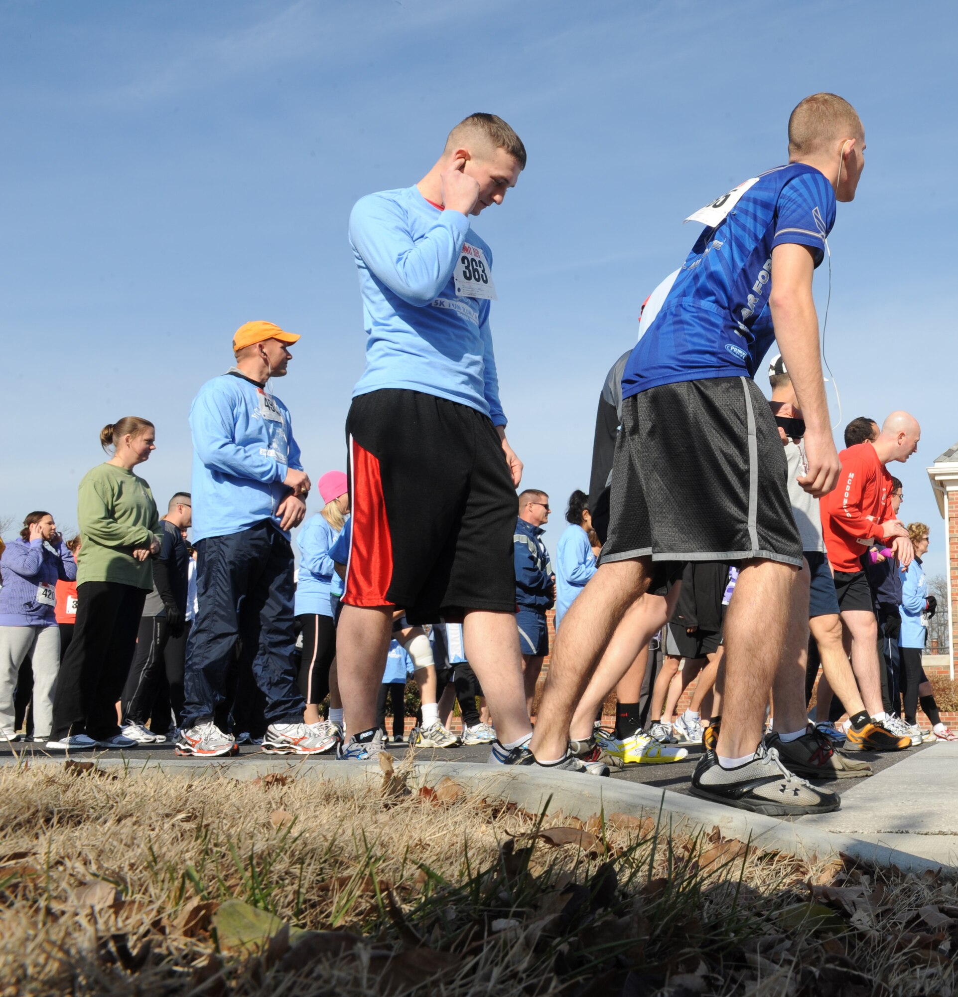 Airmen and civilians line up at the starting point of the 5k Frigid Run Dec. 10, 2010. More than 200 people participated in the event hosted by the 375th Force Support which was open to all members of Team Scott. (U.S. Air Force photo/ Airman 1st Class Divine Cox)