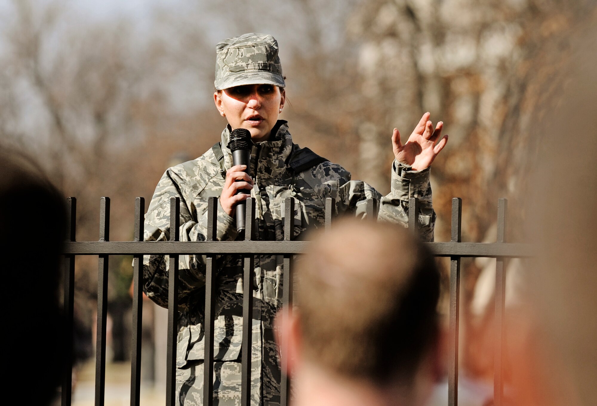 Staff Sgt. Jessica Riha, 375th Force Support Squadron fitness center customer service, announces the route prior to the start of the Holiday Frigid 5K Dec 10. More than 200 people participated in the event hosted by the 375th Force Support which was open to all members of Team Scott. (U.S. Air Force photo/ Staff Sgt. Ryan Crane)