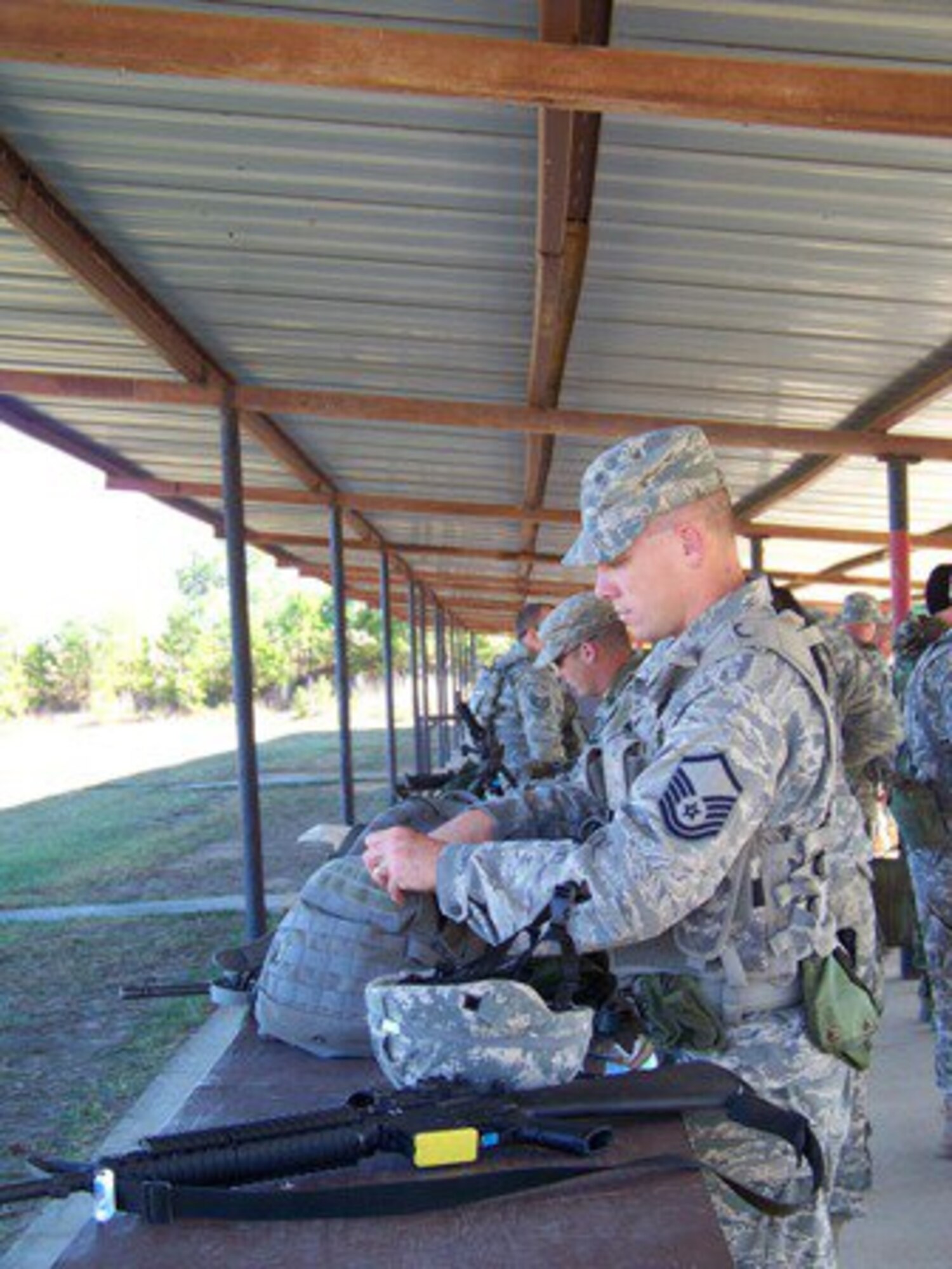Master Sgt. Benjamin Israel, 139th Airlift Wing, Security Forces Squadron, prepares to shoot at the National Guard’s Winston P. Wilson shooting exercise on Camp Joseph T. Robinson, Little Rock, Ark., in October. The Wing’s two marksmanship teams sent Airmen to the Guard’s state, regional and national shooting matches this year. (Photo by Ann Keyes, Missouri National Guard) (Released)