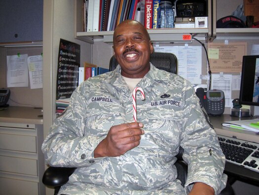 Chief Master Sgt. Stephen Campbell, 4th Air Force Air Transportation Superintendent, spreads some holiday cheer in his office at March Air Reserve Base, Calif., Dec. 6, 2010.  