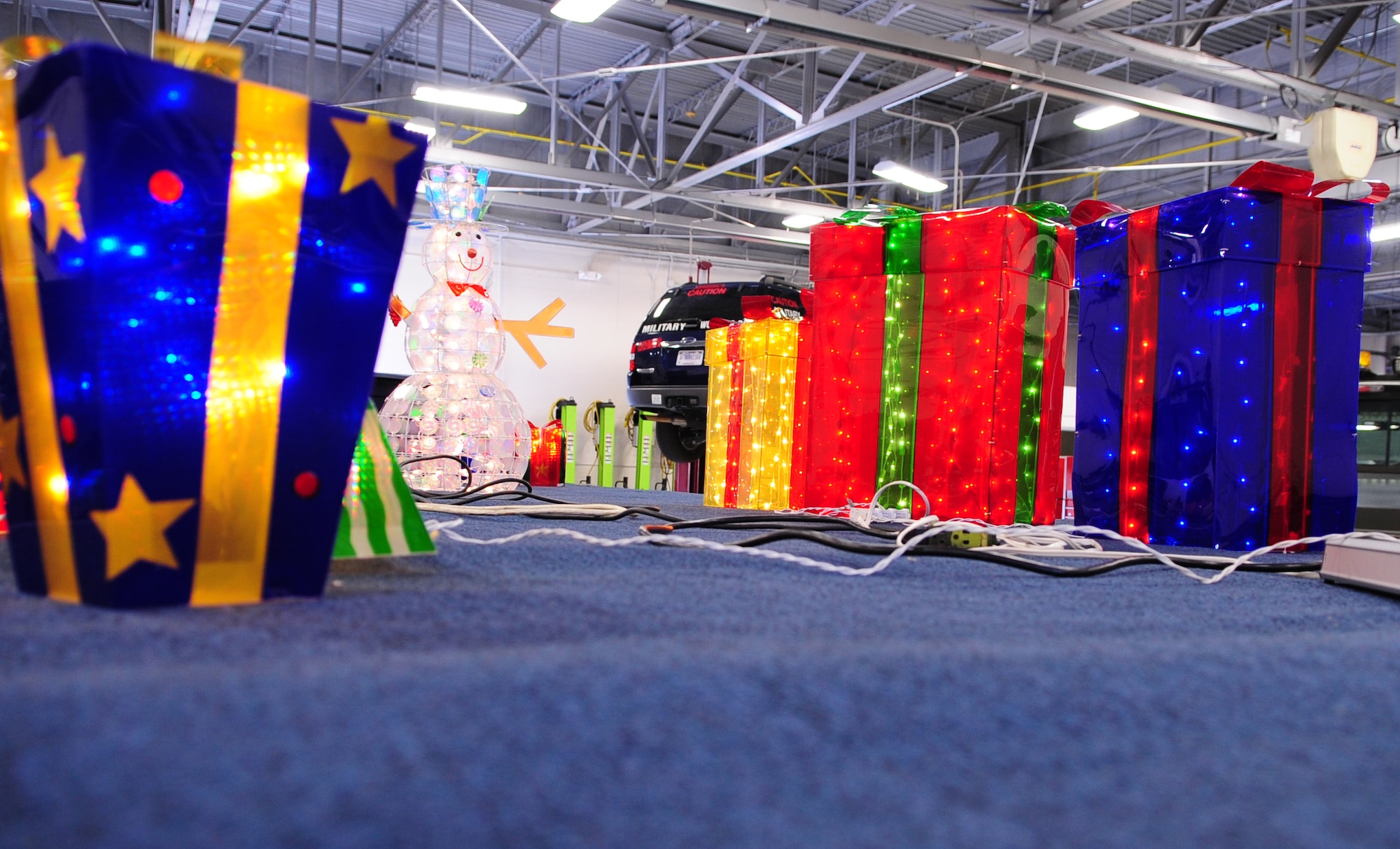 MOODY AIR FORCE BASE, Ga. -- Members from the 23rd Logistics Readiness Squadron test the decoration lights on a float Dec. 9. For the past 15 years the squadron has decorated a holiday float to display for the children of Moody. (U.S. Air Force photo/Senior Airman Stephanie Mancha)(RELEASED)