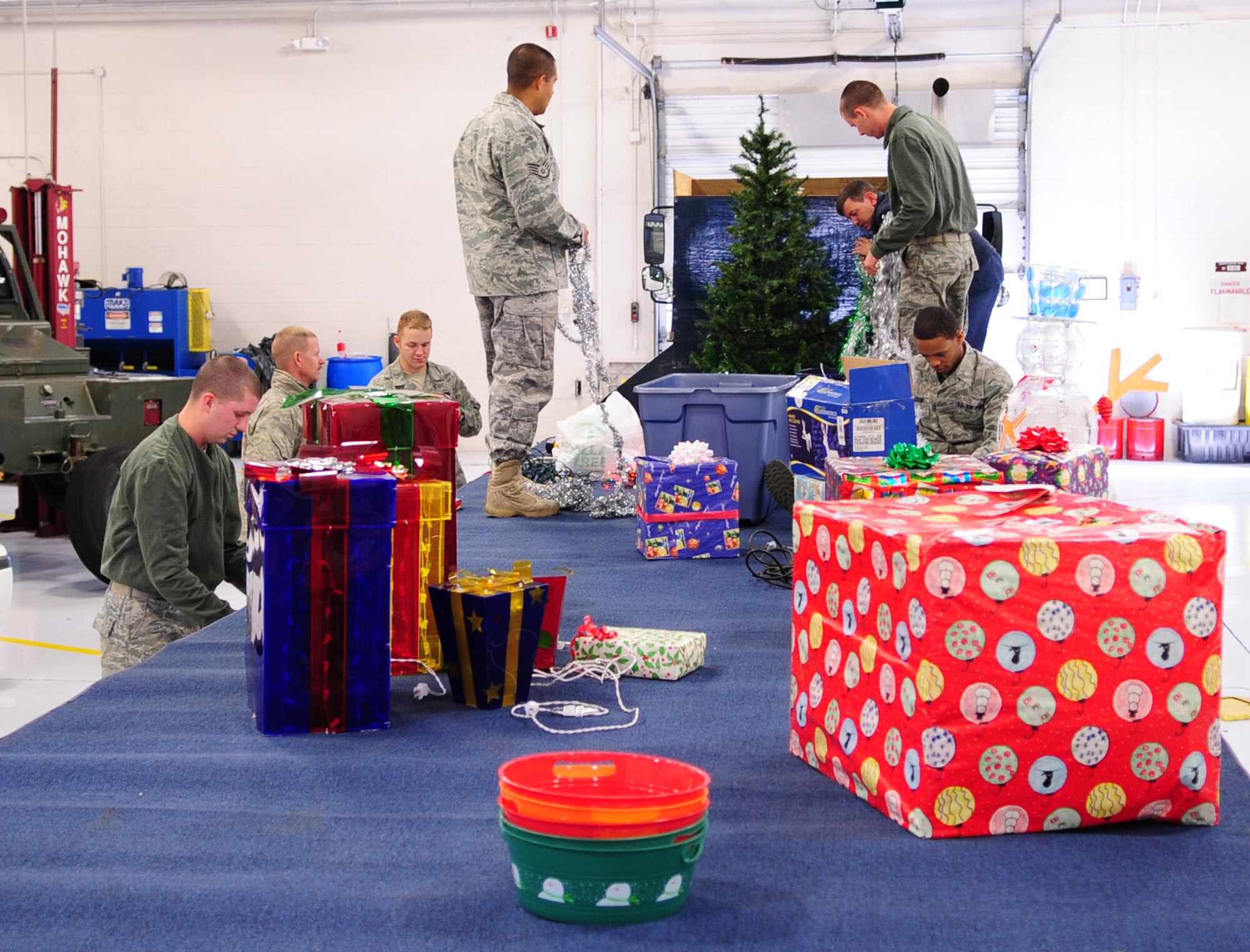 MOODY AIR FORCE BASE, Ga. -- Members of the 23rd Logistics Readiness Squadron begin making decorations for the float that will appear in the Annual Base Tree Lighting and Holiday Parade Dec. 9. This is the squadron’s 15th year building a float for the parade. (U.S. Air Force photo/Senior Airman Stephanie Mancha)(RELEASED)