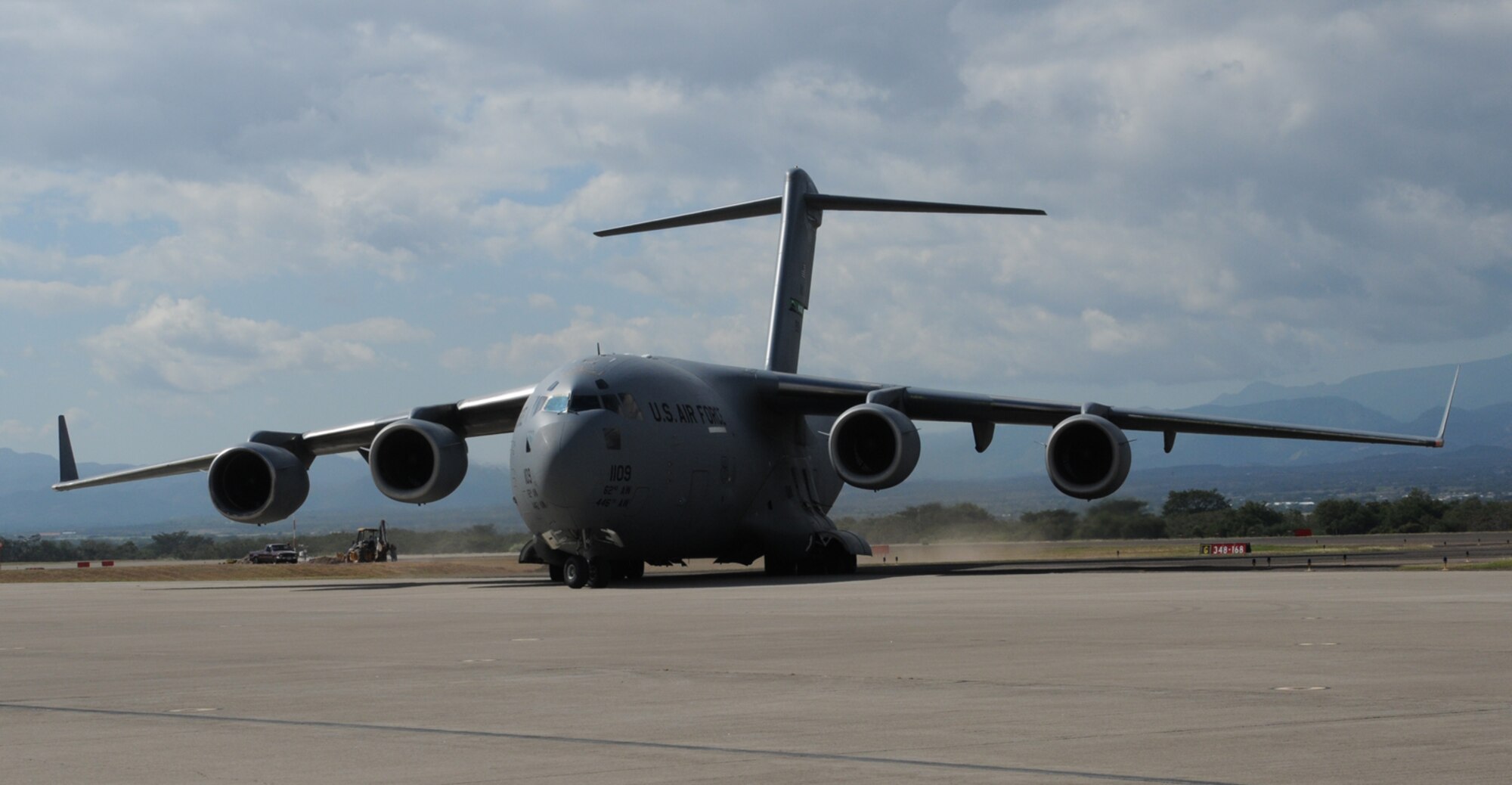 SOTO CANO AIR BASE, Honduras --  A C-17 Globemaster III from McChord Air Force Base, Wash., taxis from the runway here Dec. 9. The aircraft delivered a Black Hawk helicopter, which had been gone from the base for almost two years. (U.S. Air Force photo/Tech. Sgt. Benjamin Rojek)
