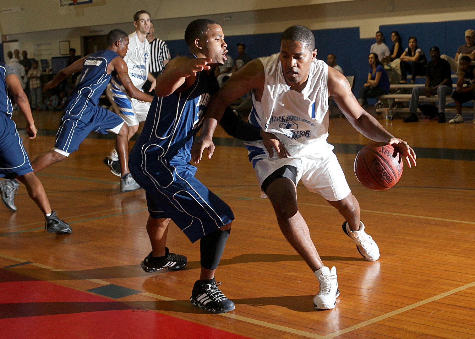 Dwight Taylor, Warhawks shooting guard, leads a fast break against Goodfellow during a first-round victory at the Warhawk Fitness Center Dec. 4. Taylor was named most valuable player of the Joe Hall Tournament. (U.S. Air Force photo/Robbin Cresswell)  