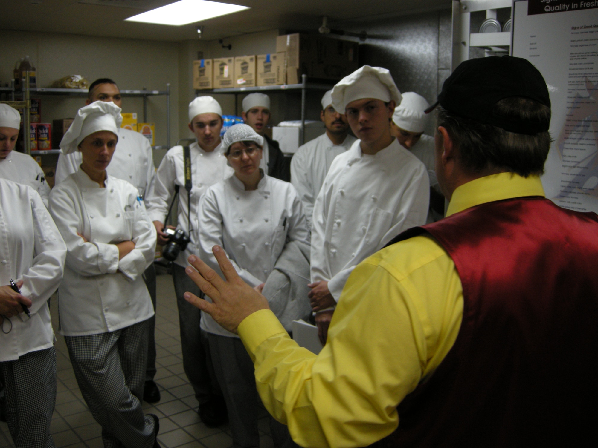 Robert Vick gives Central New Mexico Community College culinary students a tour of the Thunderbird Inn dining facility on Nov. 22.