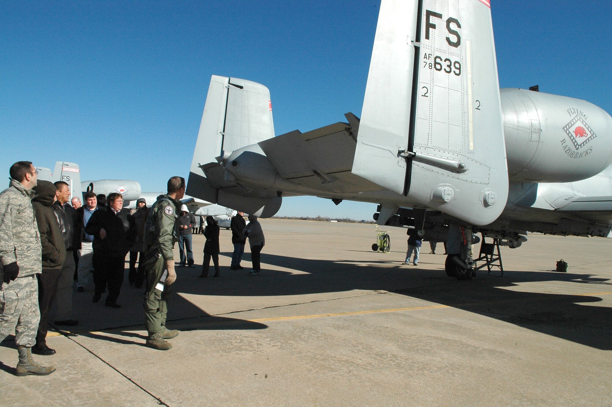 Two pilots from the Air National Guard’s 188th Fighter Wing at Fort Smith, Ark., visited Tinker Nov. 30, and met with engineers from the Aerospace Sustainment Directorate’s Specialty Engine Branch. The branch oversees sustainment of the A-10’s twin-powerplant TF34 engines. The meeting, organized by Col. Joe Wilson, ANG advisor to the OC-ALC commander, gave the warfighters a chance to thank the people who support their mission and gave the engineers an up close look at how their job impacts the mission. (Air Force photo by Micah Garbarino)