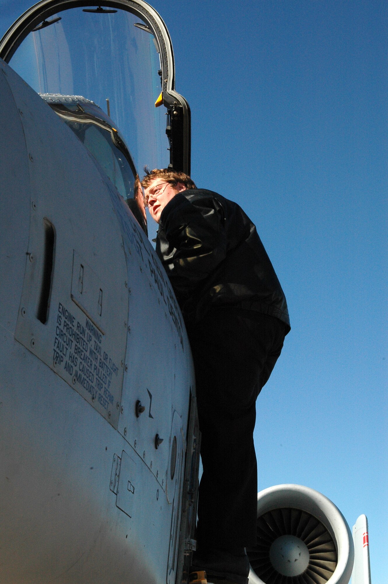 Steven Powers, an engineer with the Aerospace Sustainment Directorate Specialty Engine Branch, checks out the flight controls of the A-10 “Warthog” during a visit from Air National Guard pilots meant to bring the warfighters and engineers closer together. The visit let the pilots thank those who put the “air in Air Power,” and allowed the engineers to see how important their jobs are to supporting the mission. (Air Force photo by Micah Garbarino)