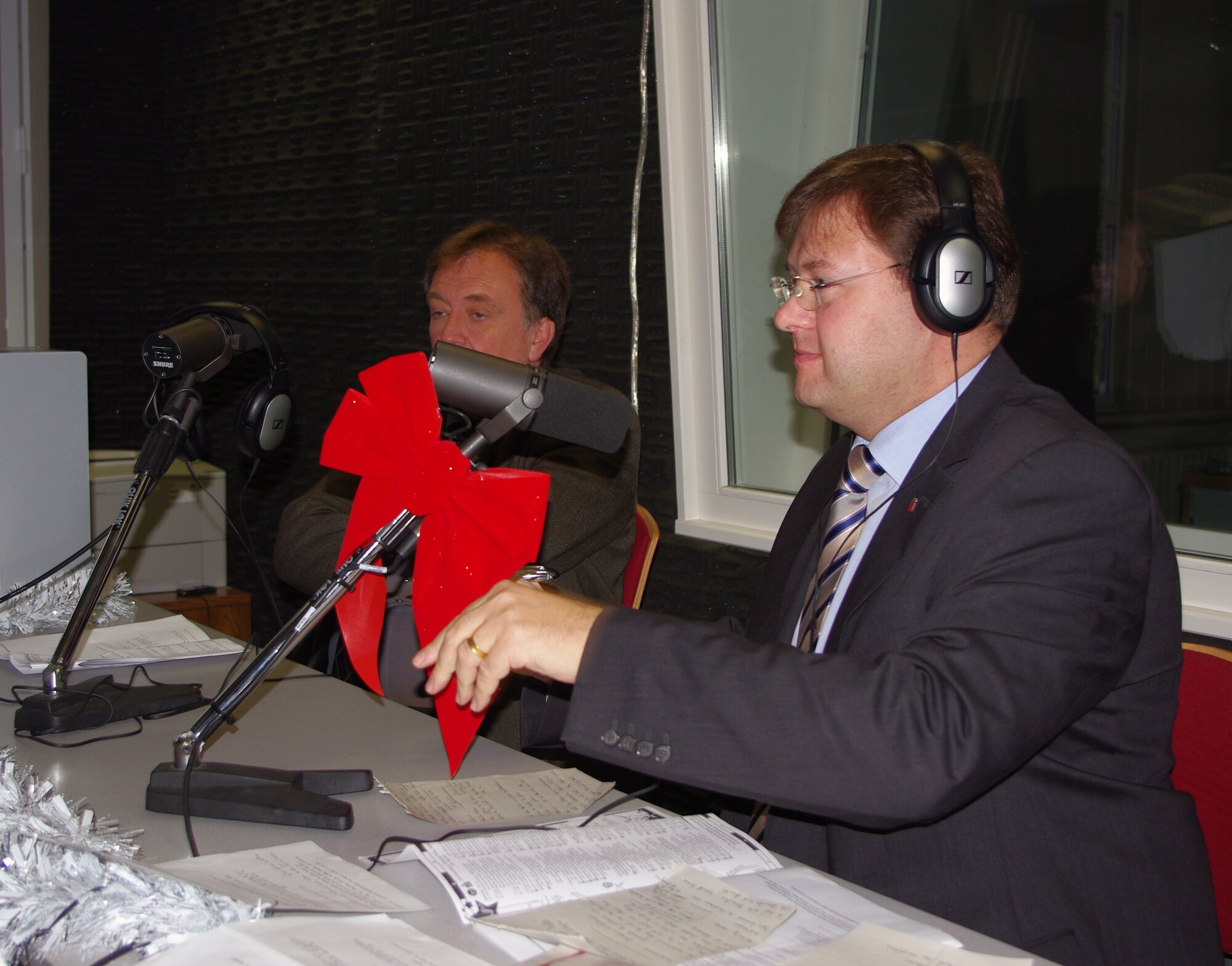 BITBURG, Germany -- Mr.  Joachim Kandels, Bitburg mayor, visits the American Forces Network-Spangdahlem morning show,  Dec. 8, talking about events and activities in the Bitburg area and how U.S. servicemembers and their families are always welcome. He also received a tour of the facilities when the interview was done. (U.S. Air Force photo/Iris Reiff)